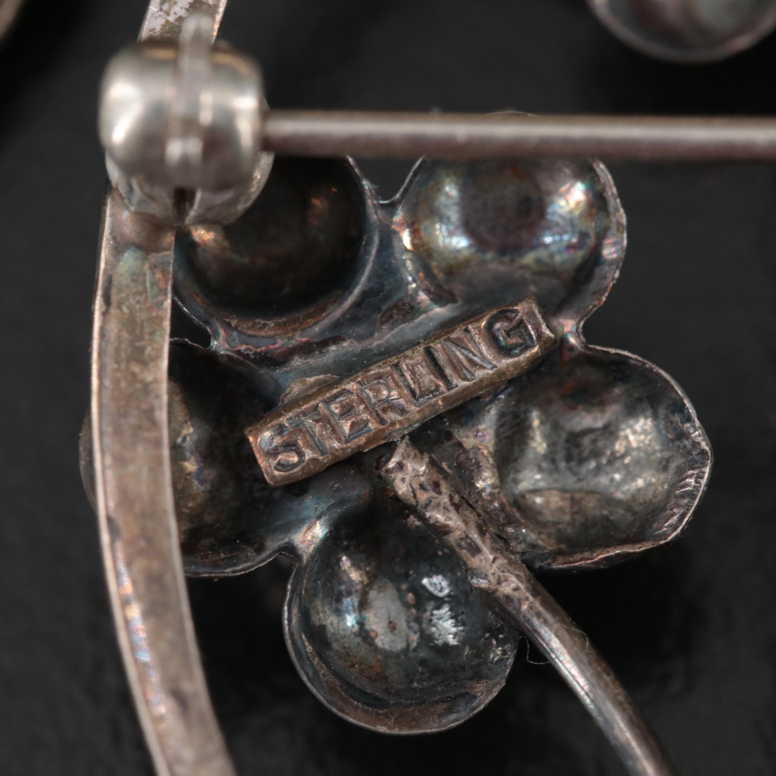 Sterling Cupid Brooch and US Navy Pin Featured in Vintage Jewelry