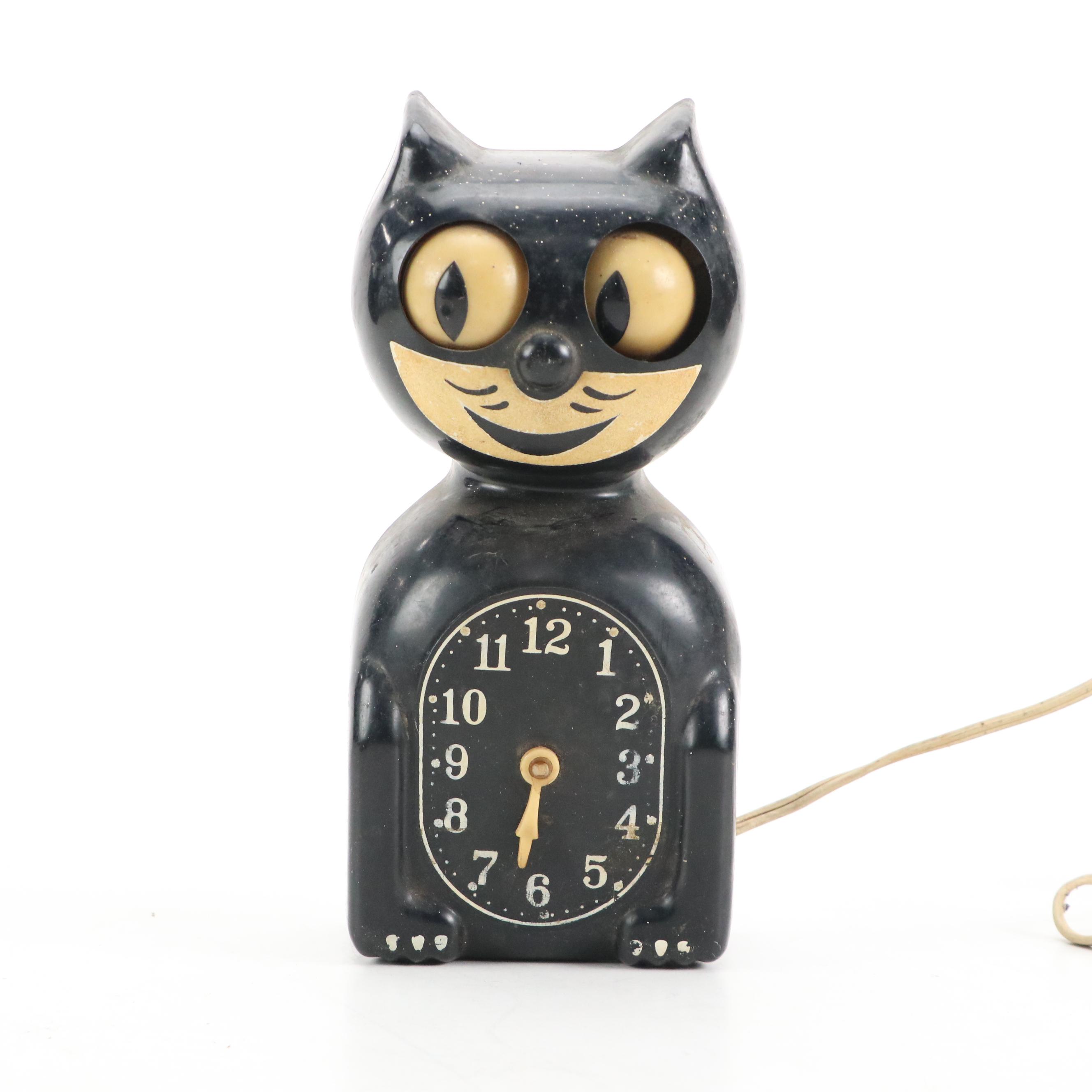 Novelty Kit Cat Clock and Amico Cookie Radio with Westclox Clock Radio