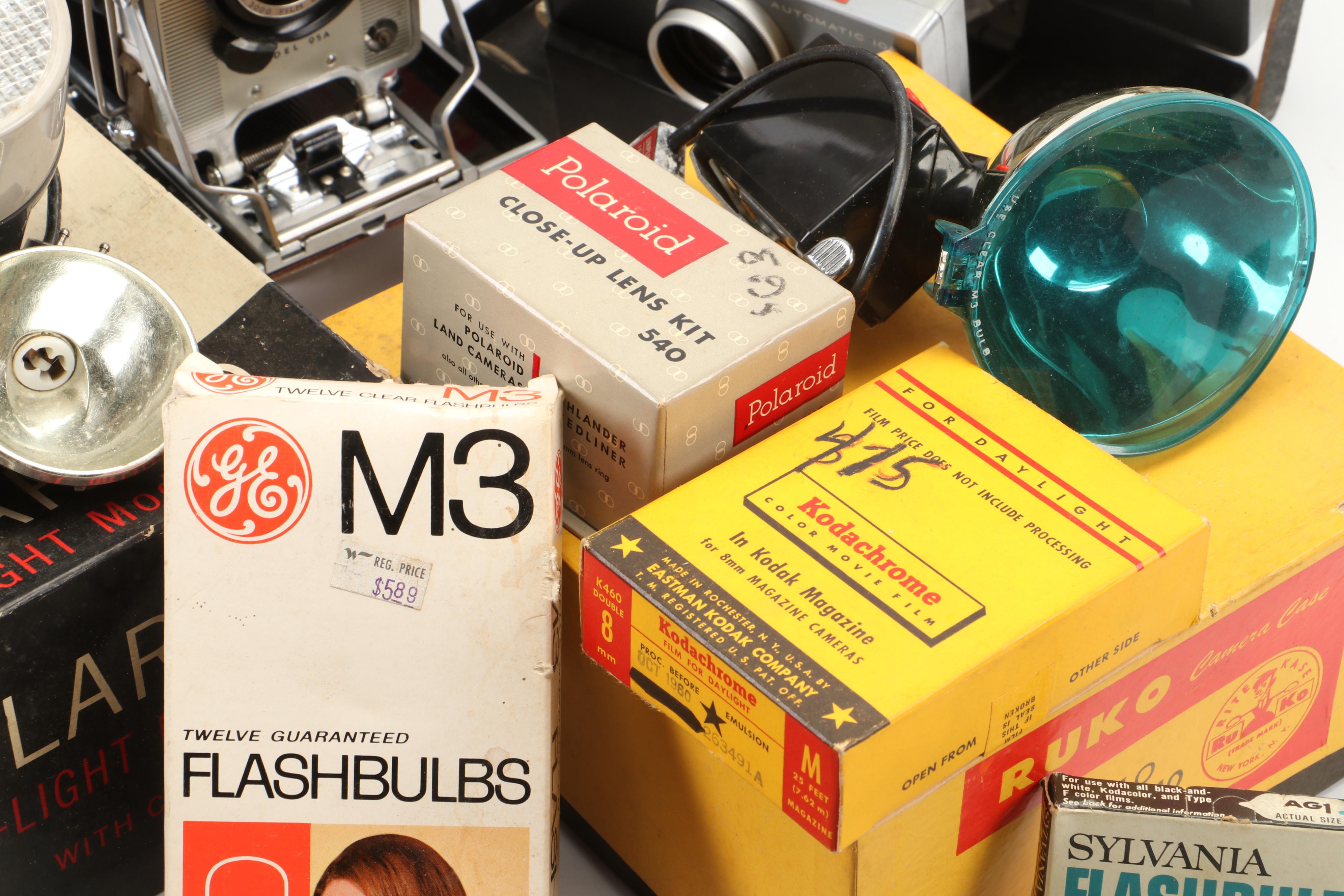 Polaroid Land Camera Automatic 100 and Model 95A with Flashes and Accessories