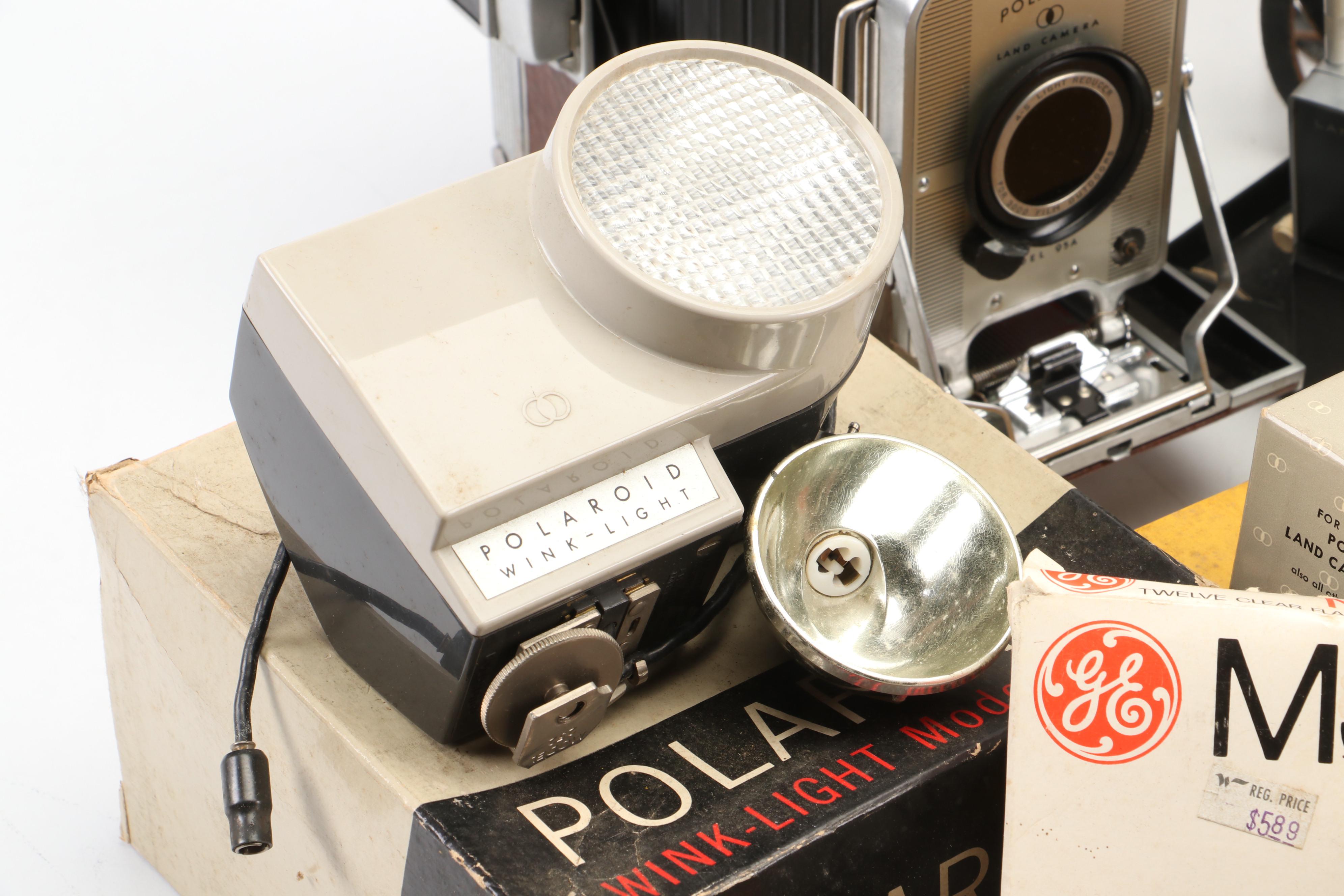 Polaroid Land Camera Automatic 100 and Model 95A with Flashes and Accessories