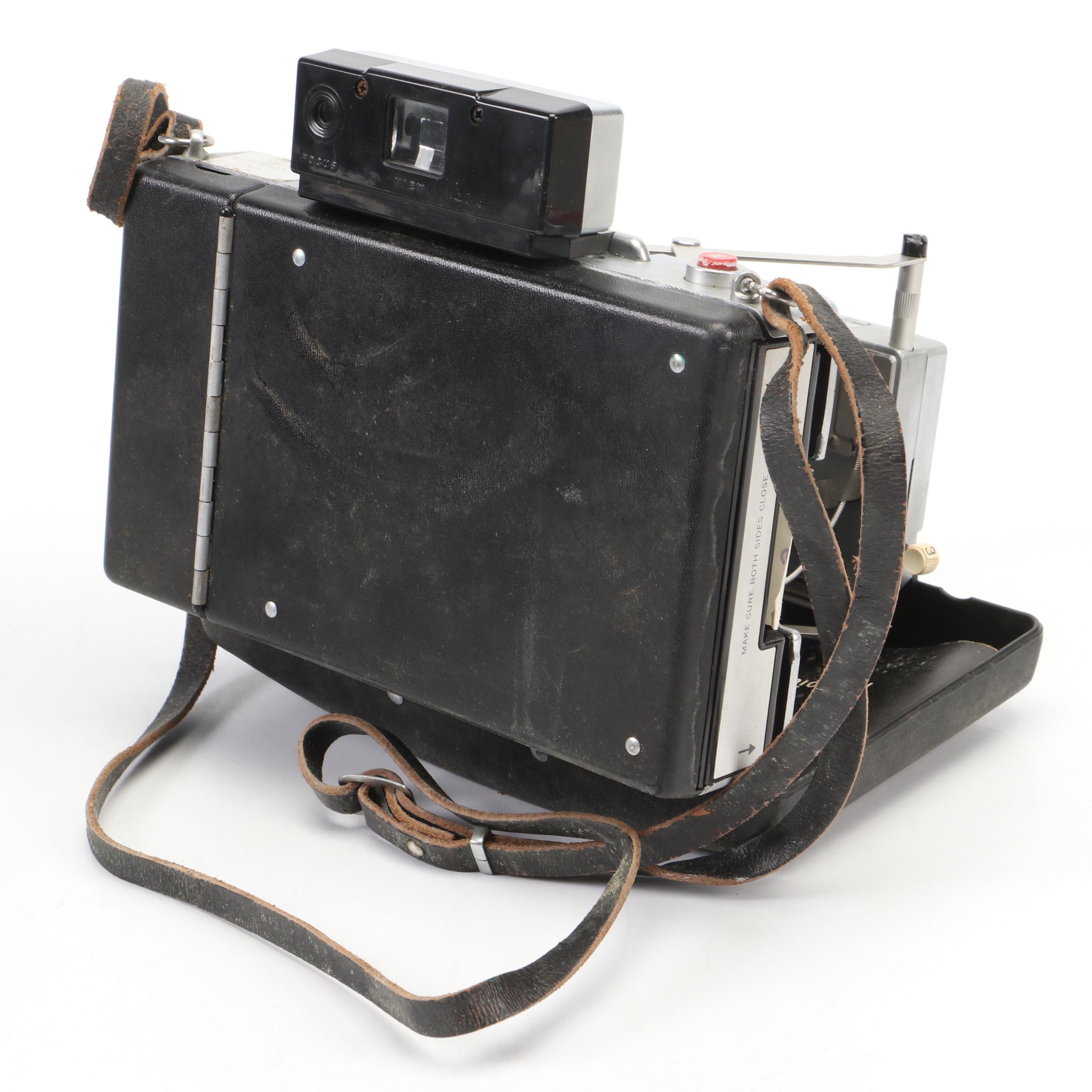 Polaroid Land Camera Automatic 100 and Model 95A with Flashes and Accessories