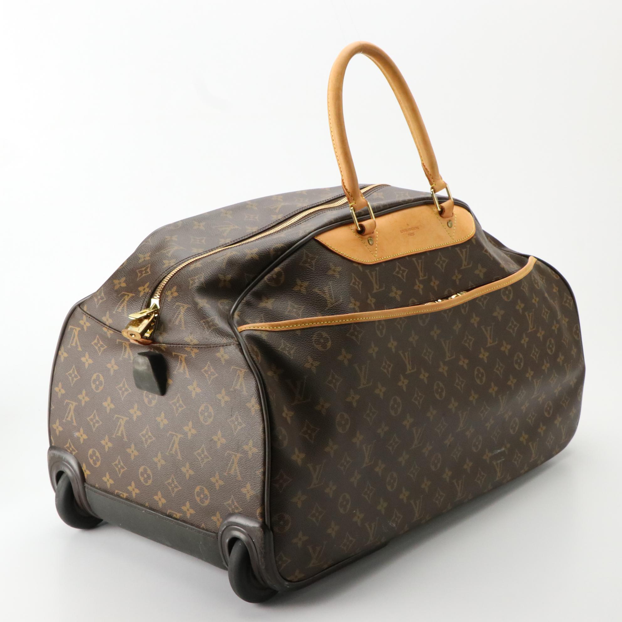 Louis Vuitton Eole 60 Rolling Duffle Bag in Monogram Canvas and Vachetta Leather