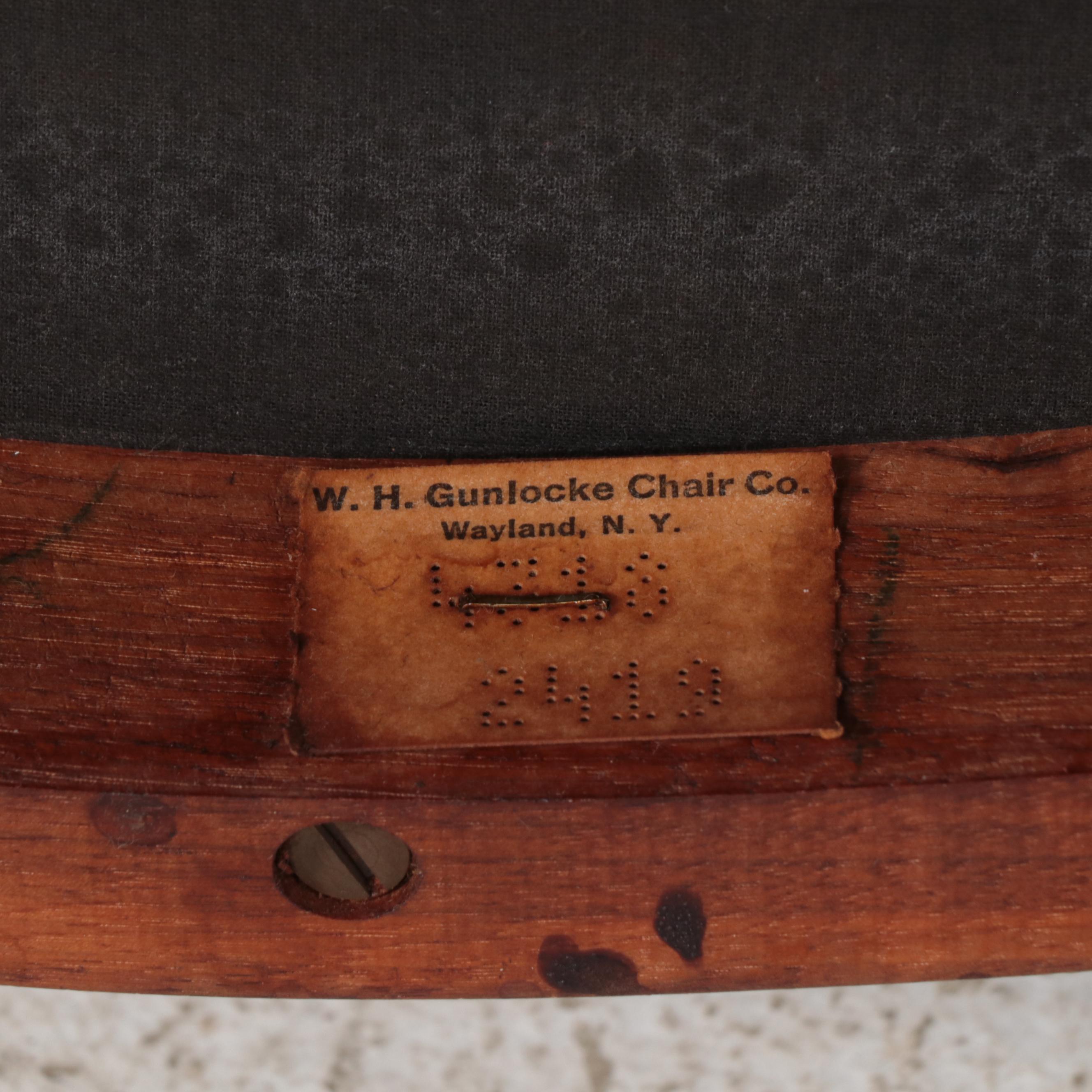 Pair of W.H. Gunlocke Chair Co. Mid Century Modern Walnut and Vinyl Armchairs