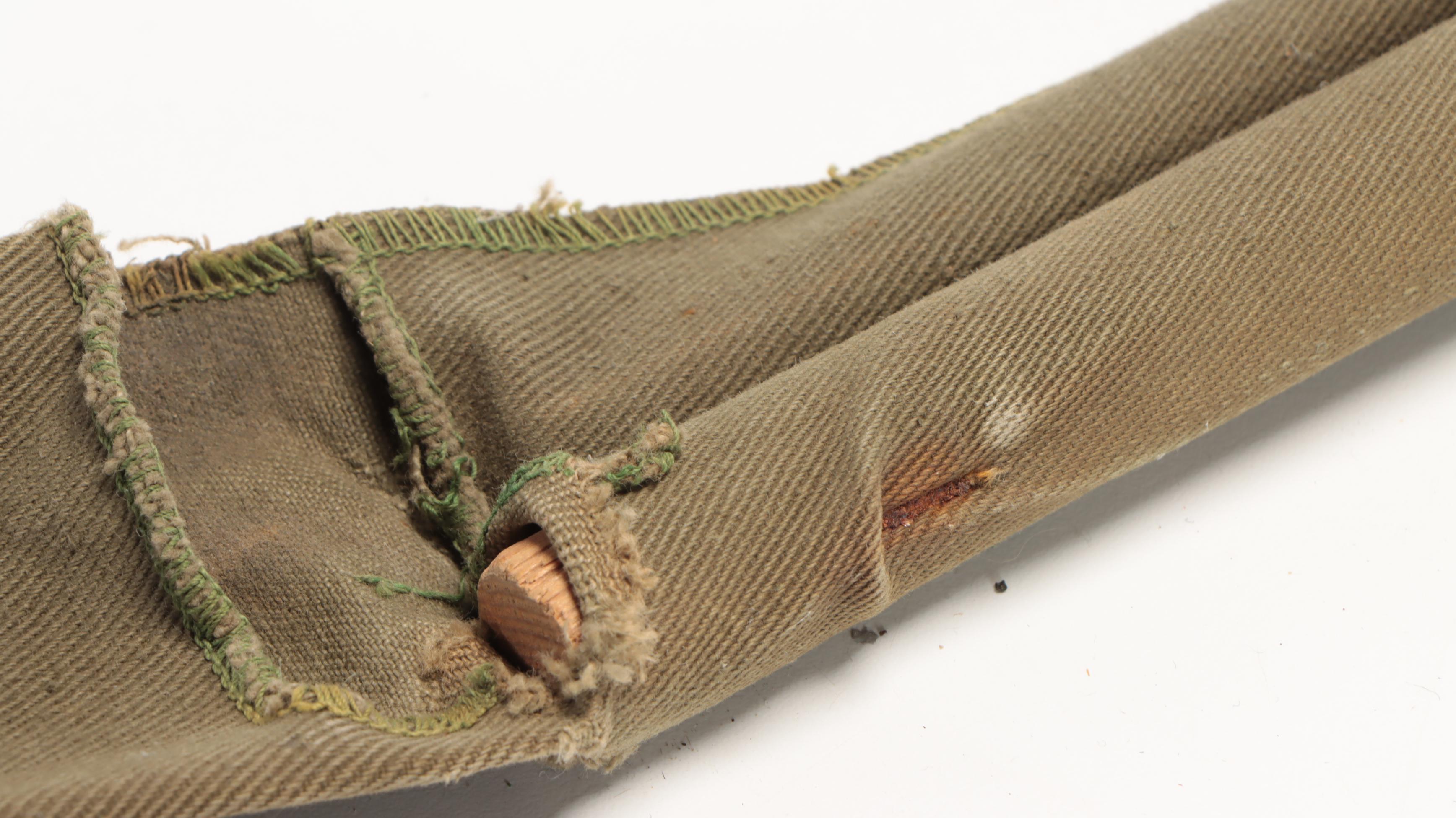 Military Ship's Brass Placard and Vintage Fishing Rod with Canvas Cover