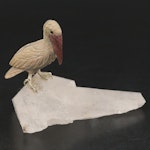Hand-Carved Stone Pelican on Quartz Base