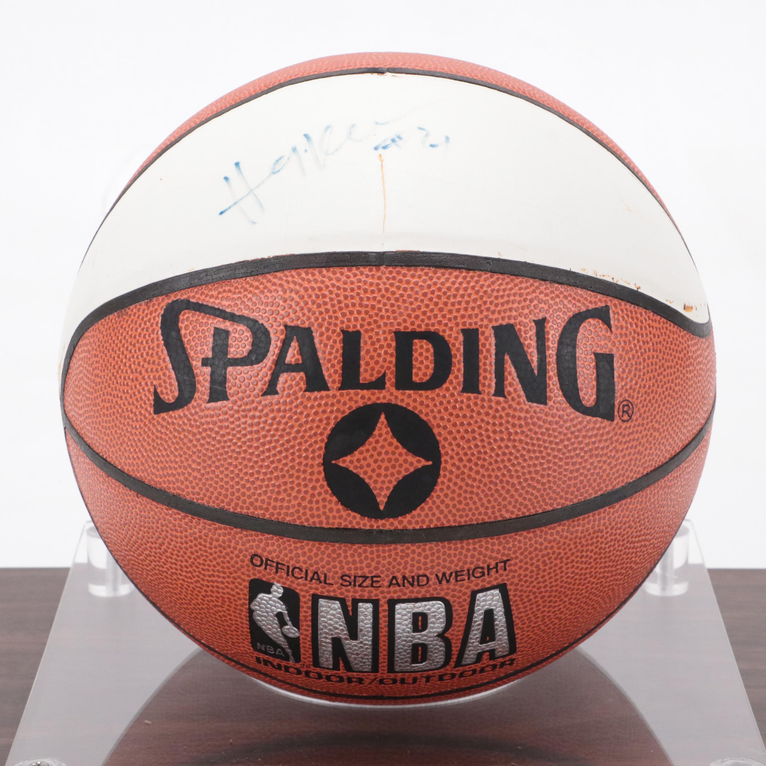 Hakeem Olajuwon Signed Spalding Basketball with Display