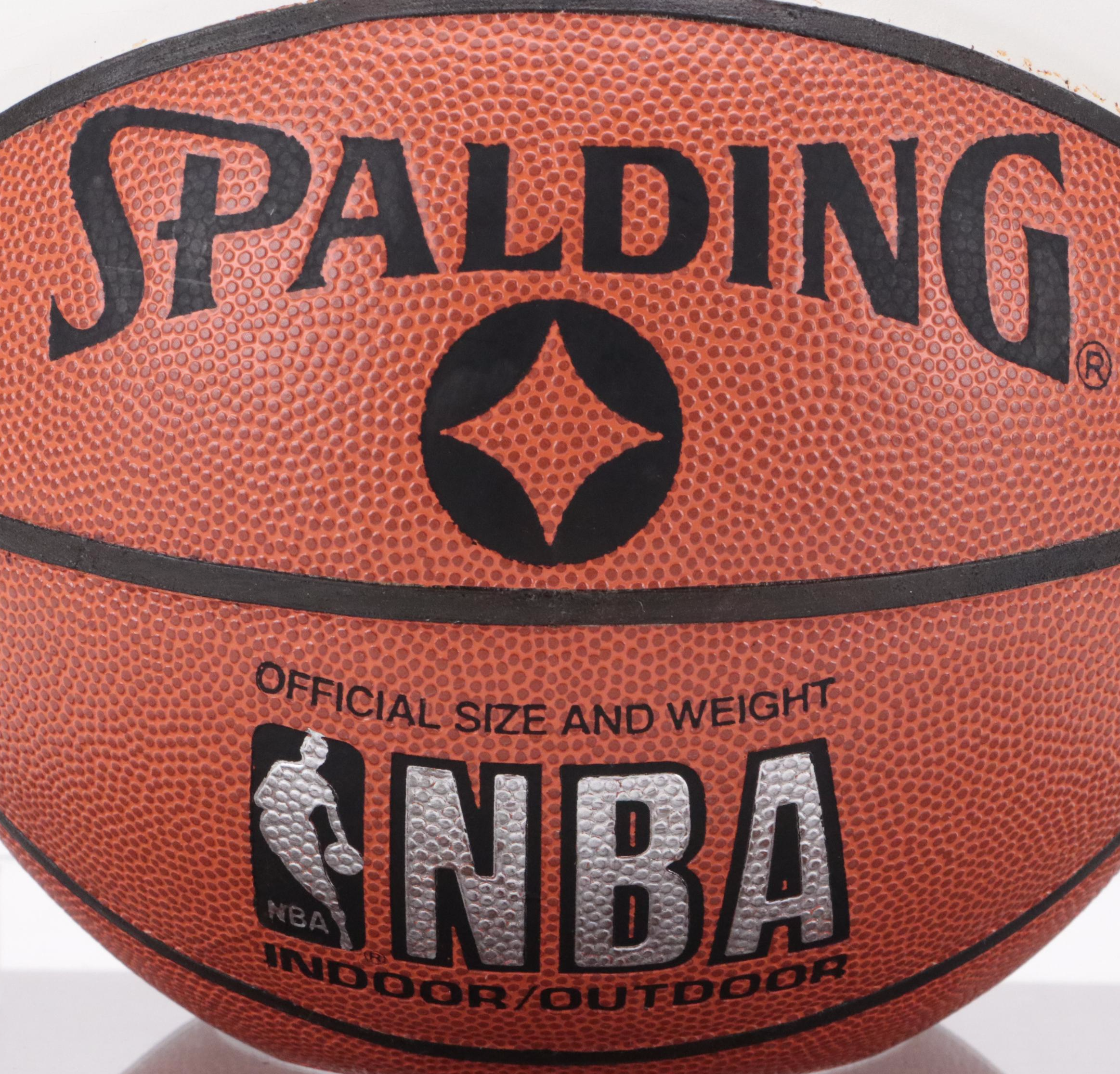 Hakeem Olajuwon Signed Spalding Basketball with Display