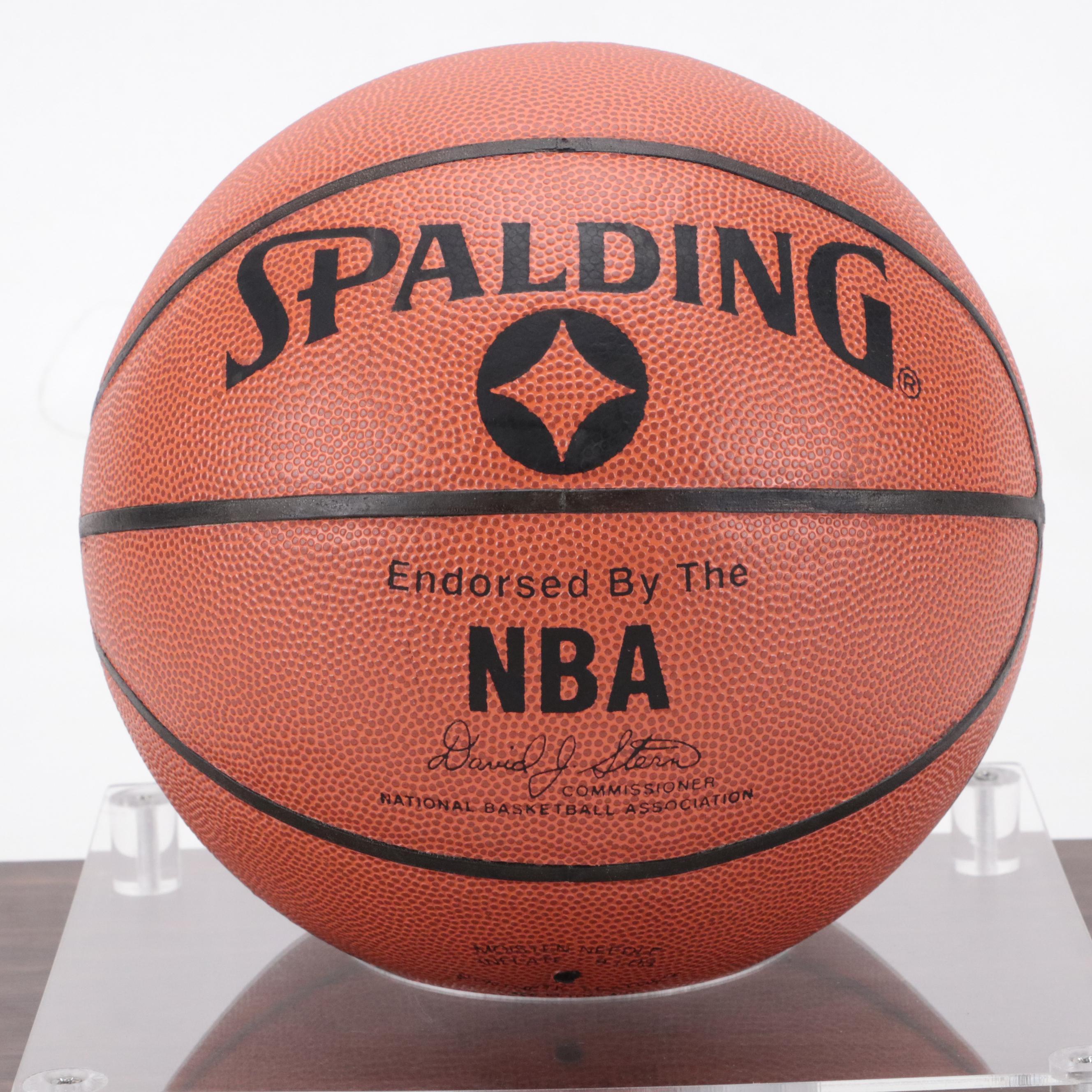 Hakeem Olajuwon Signed Spalding Basketball with Display