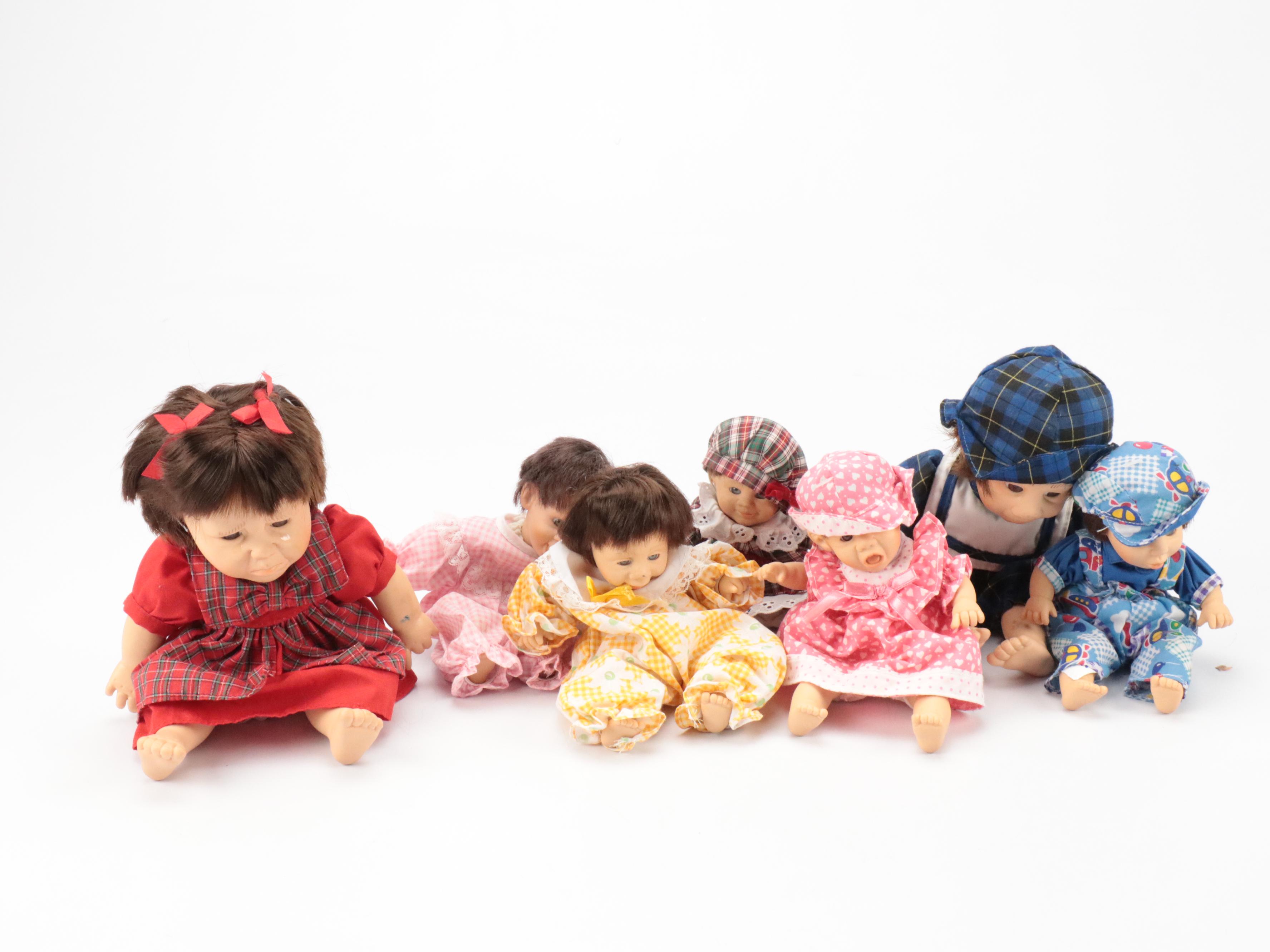 Expressive and Reposed Porcelain and Plastic Baby Dolls, Late 20th Century