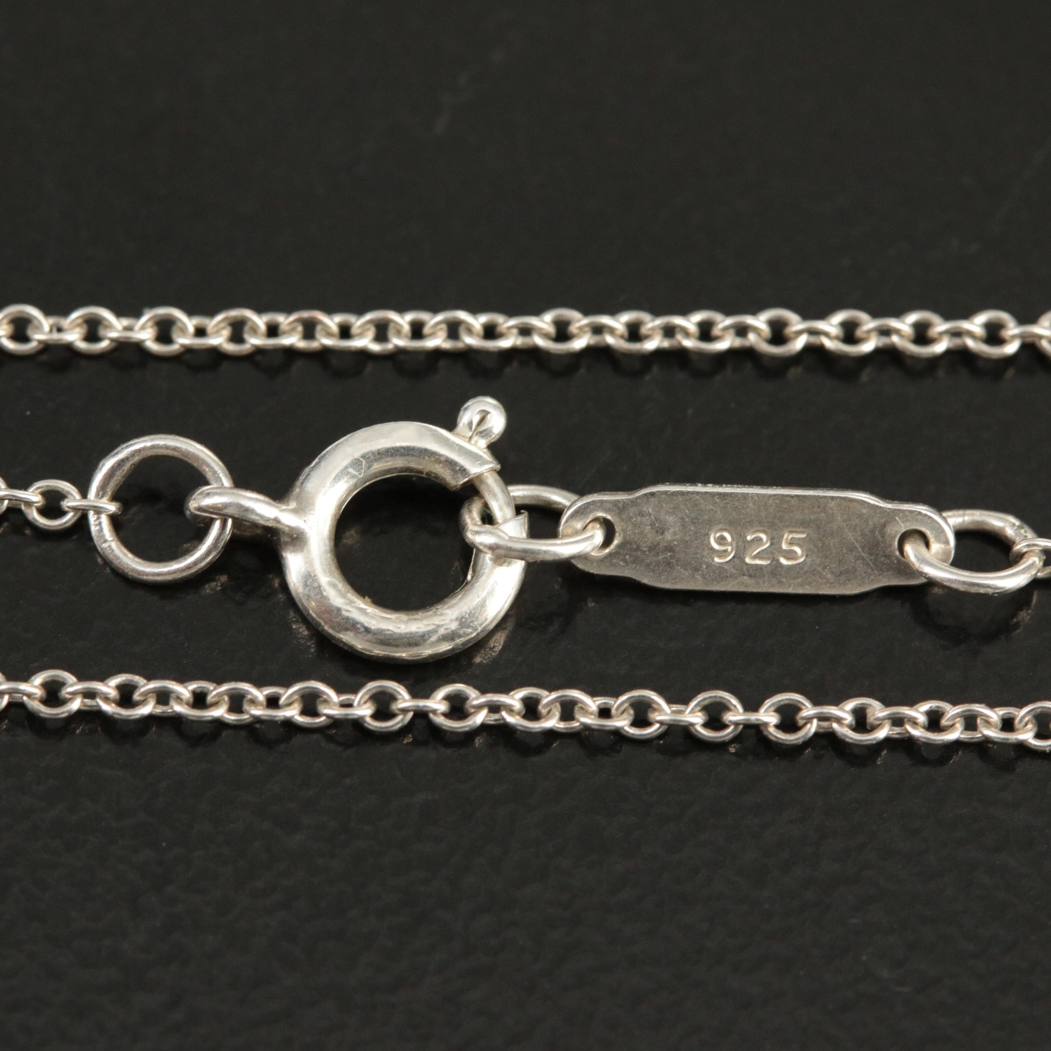 Tiffany & Co. "Notes" Sterling Disc Pendant Necklace