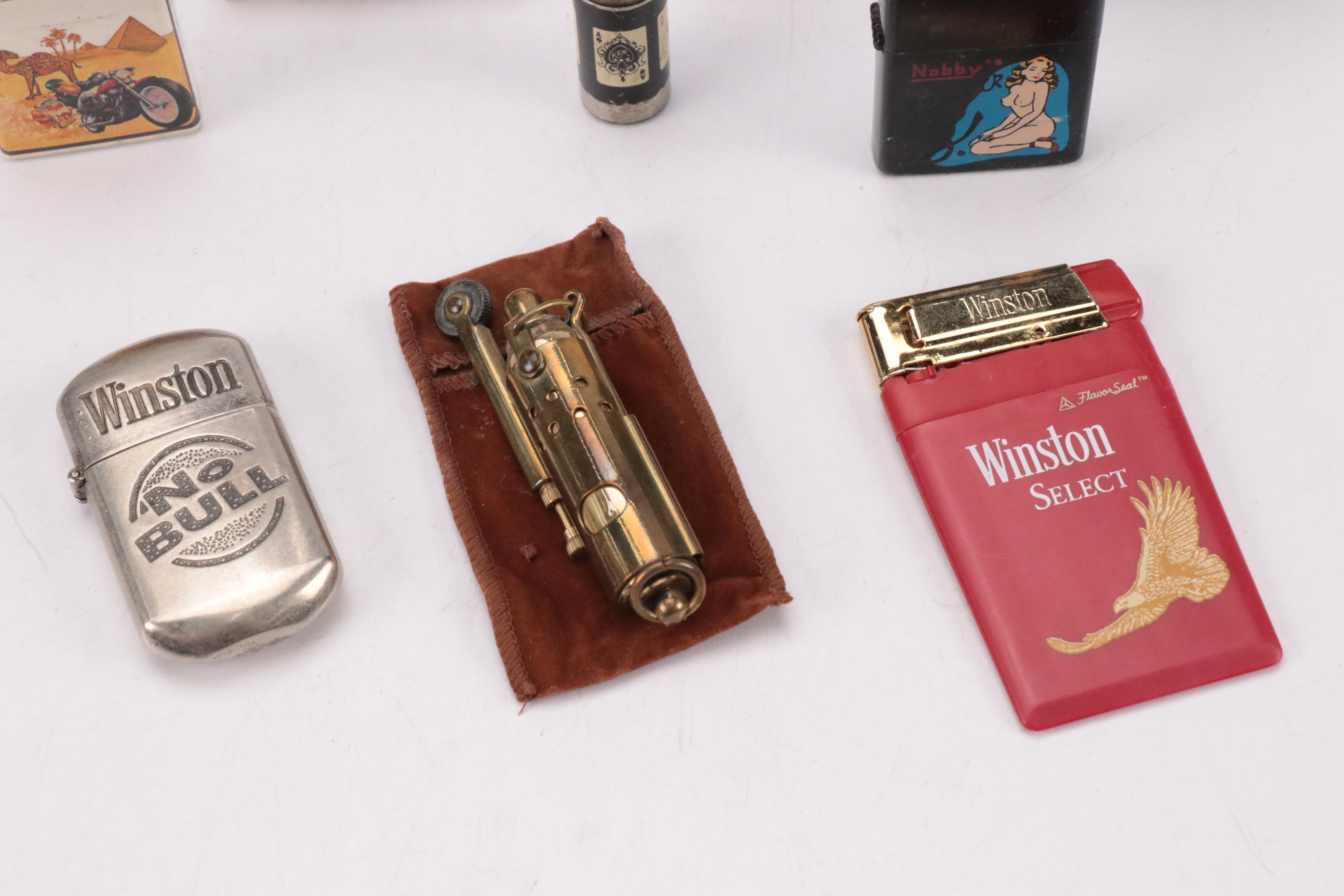 Vintage Lighter Assortment Featuring Windproof, Trench, and Novelty Styles