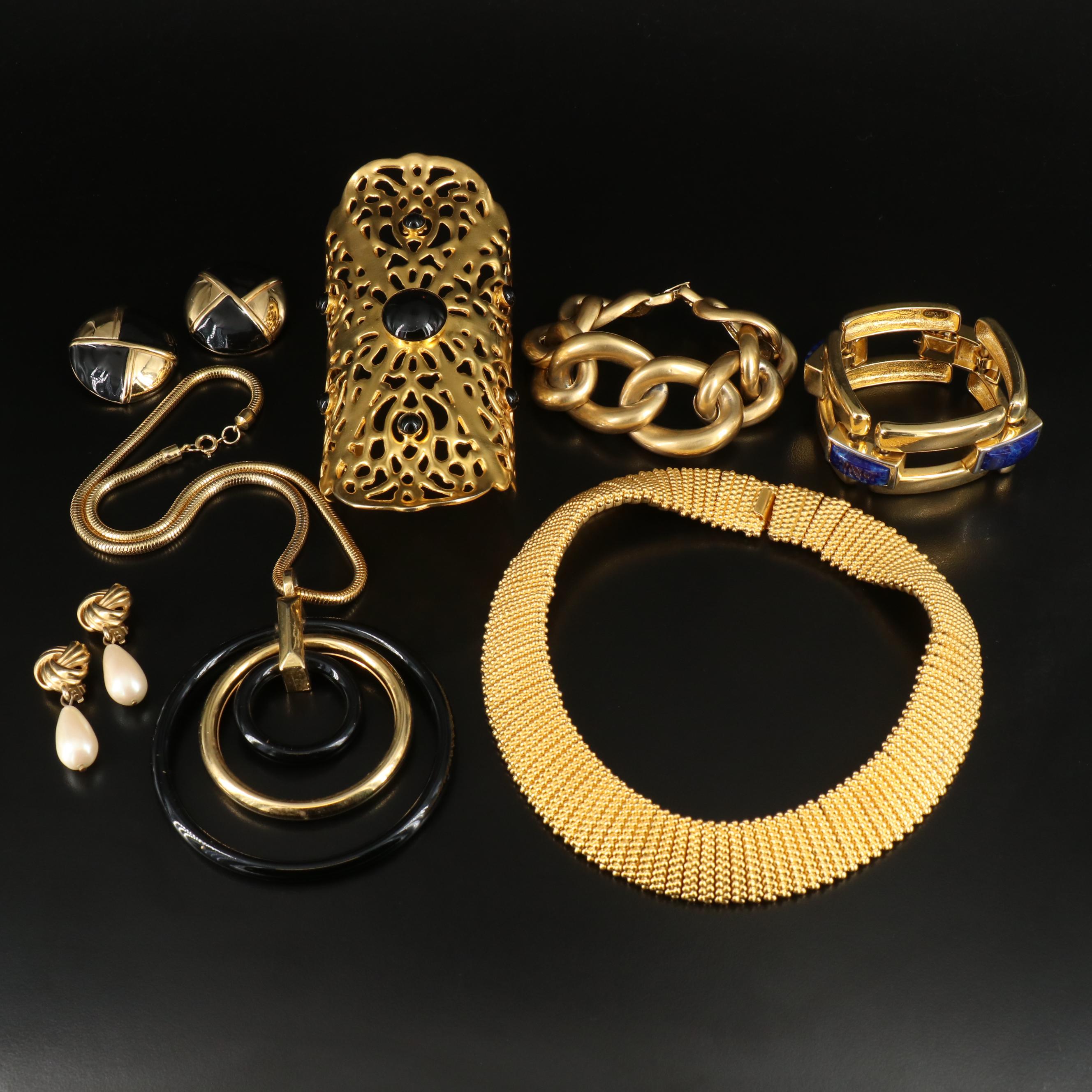 Givenchy Button Earrings & Wendy Olinger Arm Cuff Featured in Jewelry Collection