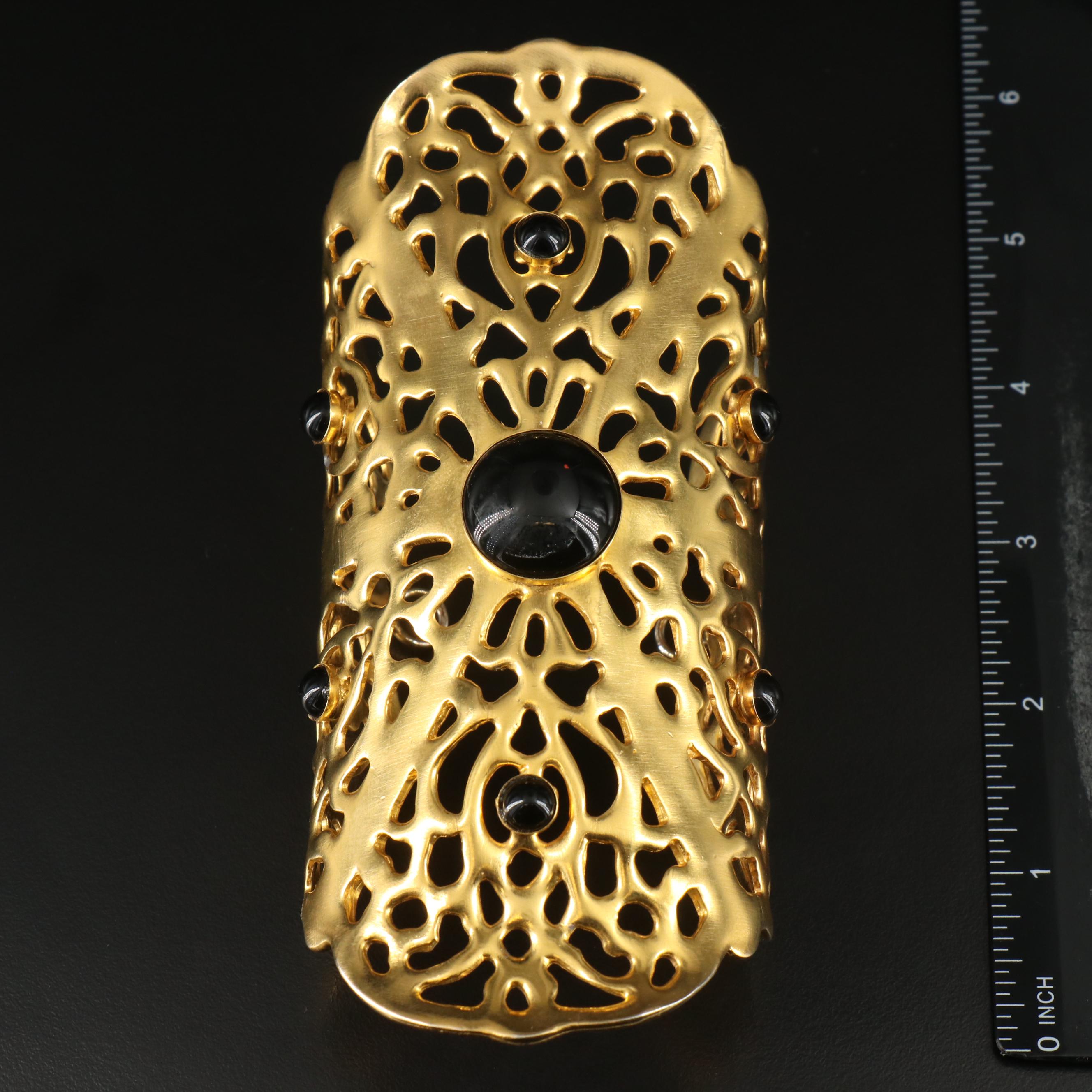 Givenchy Button Earrings & Wendy Olinger Arm Cuff Featured in Jewelry Collection