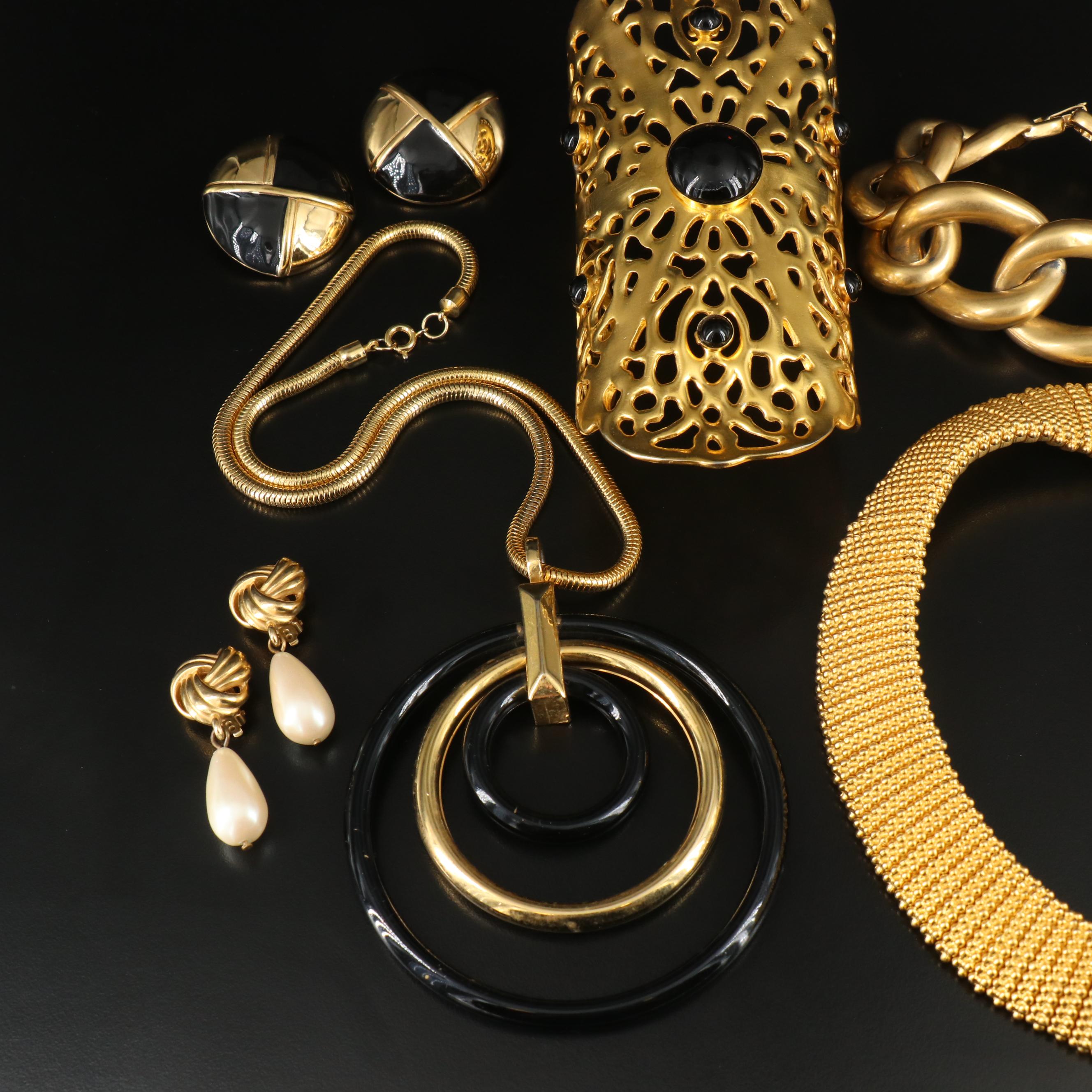 Givenchy Button Earrings & Wendy Olinger Arm Cuff Featured in Jewelry Collection