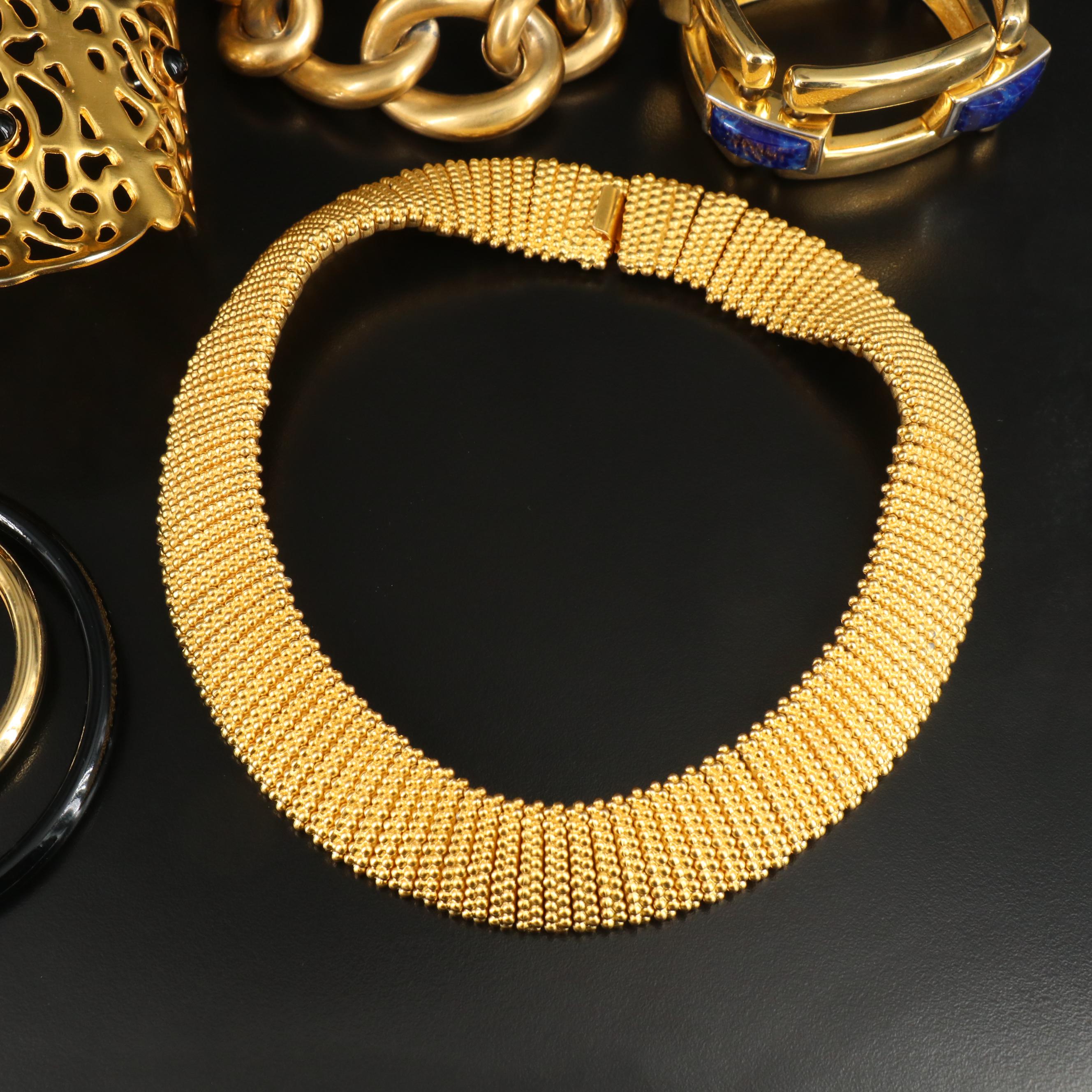 Givenchy Button Earrings & Wendy Olinger Arm Cuff Featured in Jewelry Collection