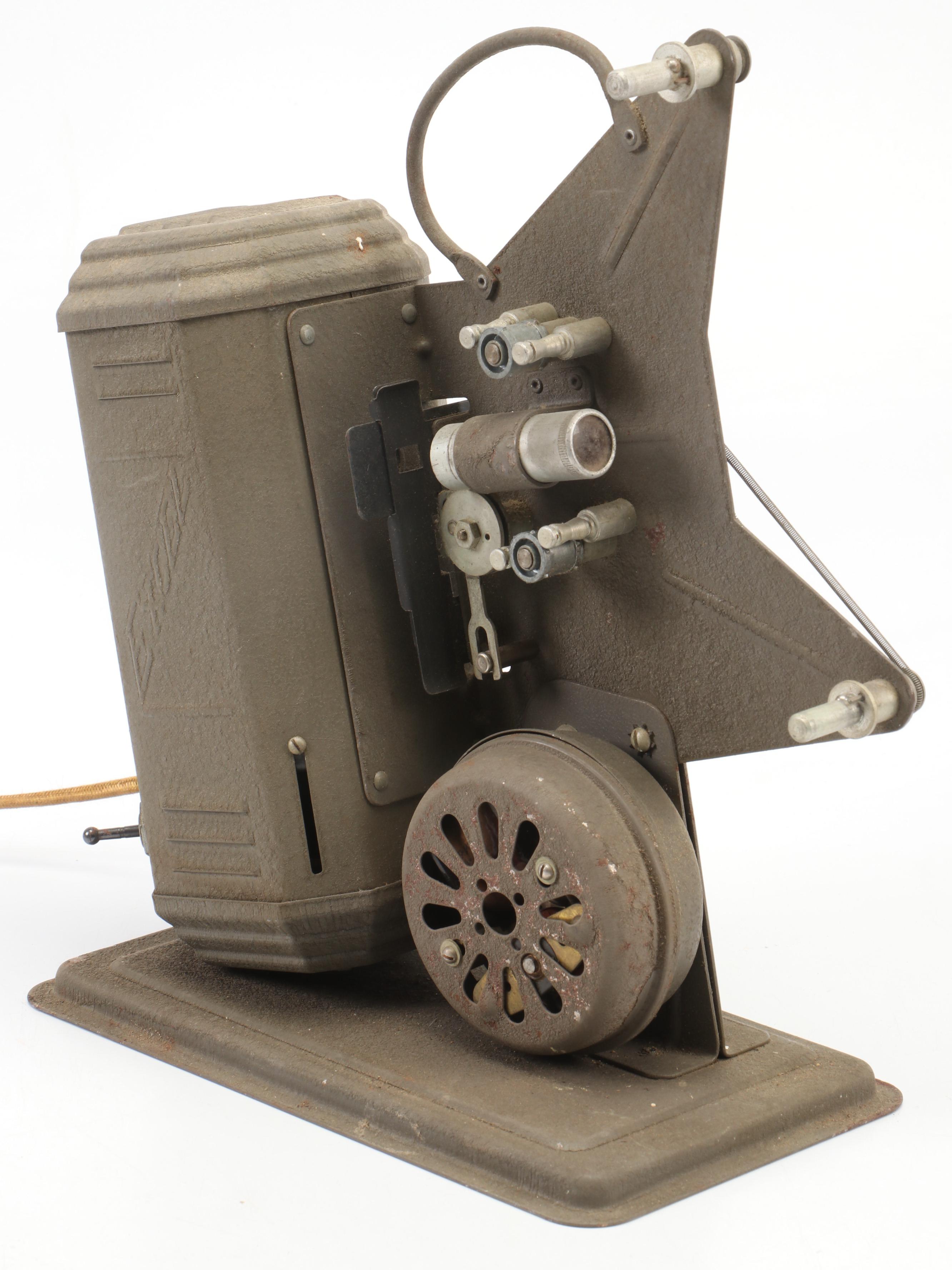 Excel 16mm Movie Projector with Mickey Mouse and Other Film Reels