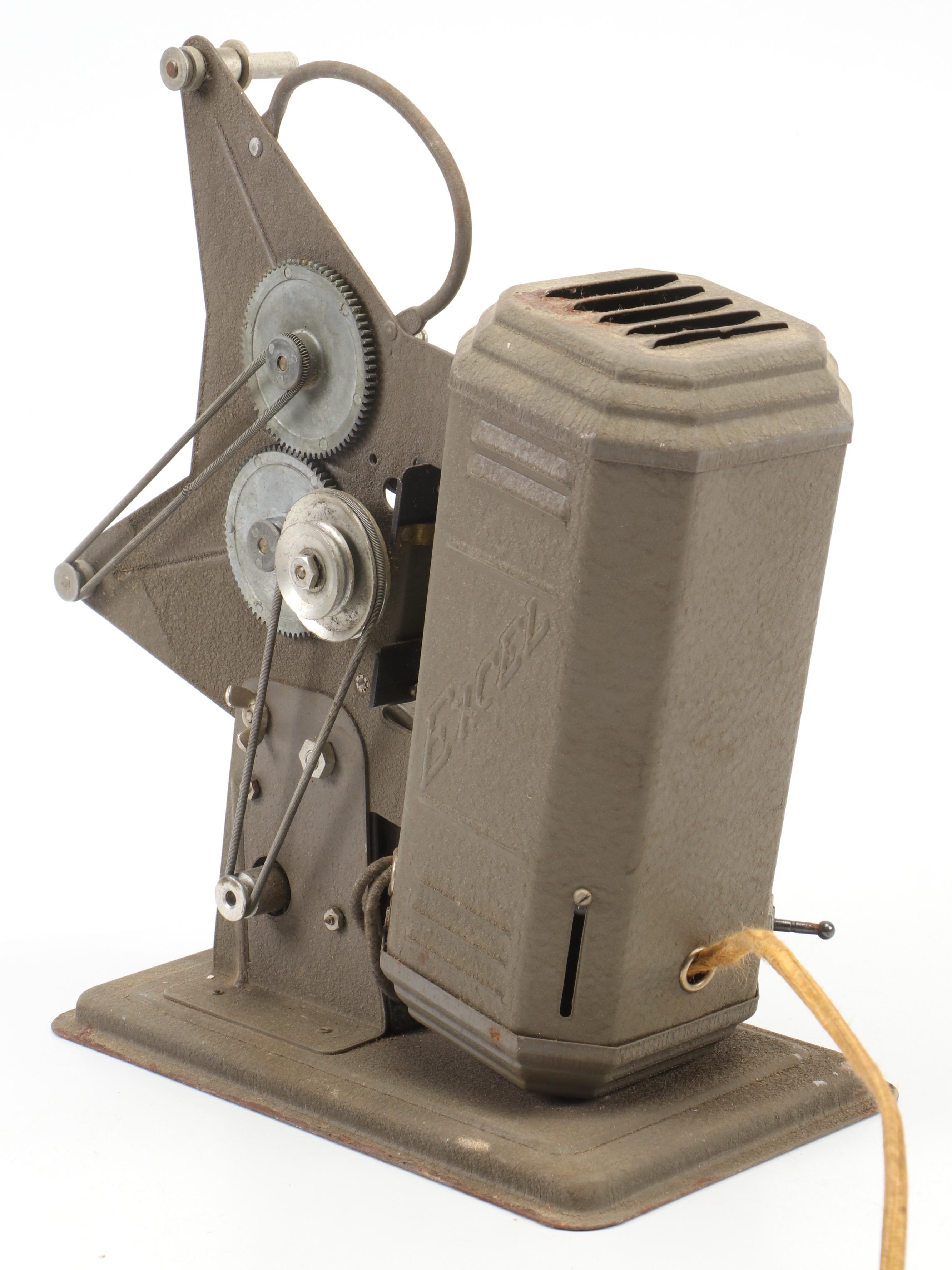 Excel 16mm Movie Projector with Mickey Mouse and Other Film Reels