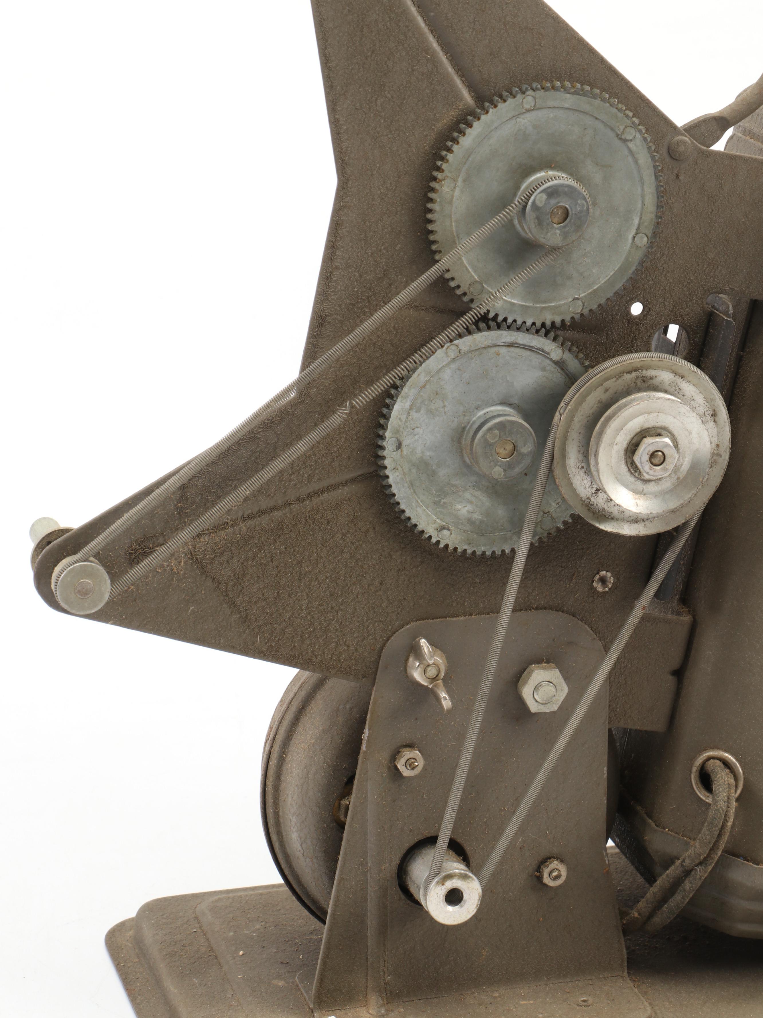 Excel 16mm Movie Projector with Mickey Mouse and Other Film Reels