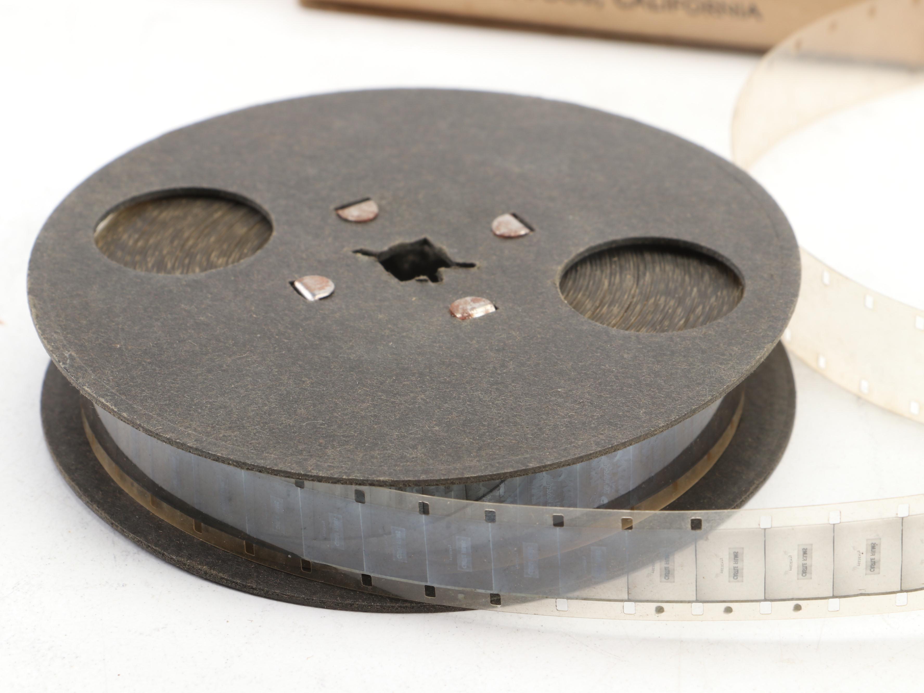 Excel 16mm Movie Projector with Mickey Mouse and Other Film Reels