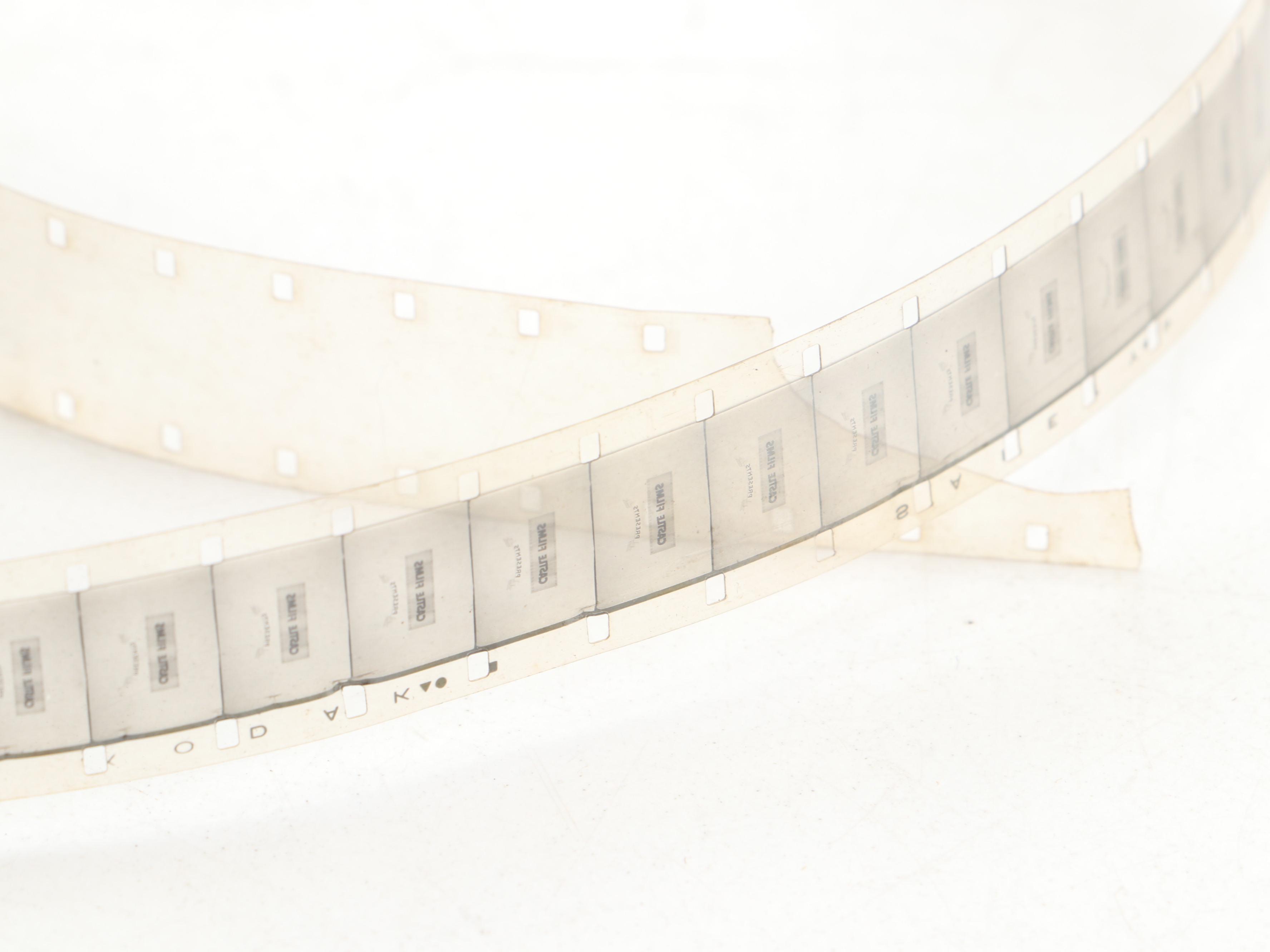 Excel 16mm Movie Projector with Mickey Mouse and Other Film Reels