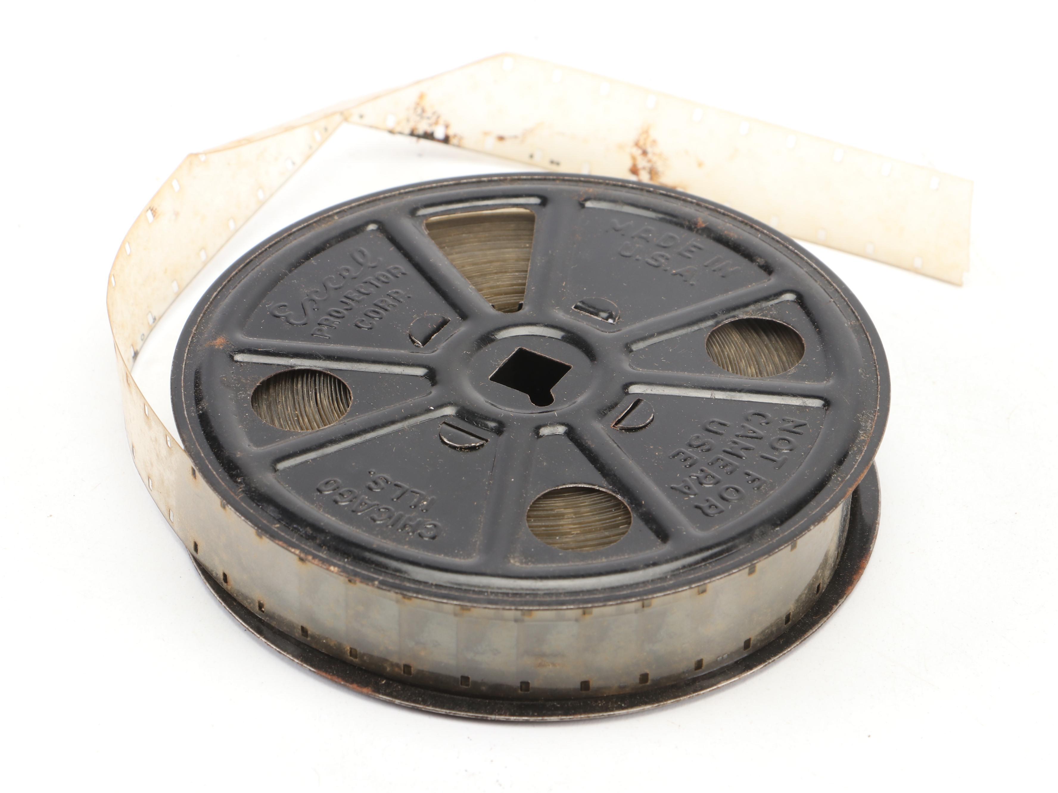 Excel 16mm Movie Projector with Mickey Mouse and Other Film Reels