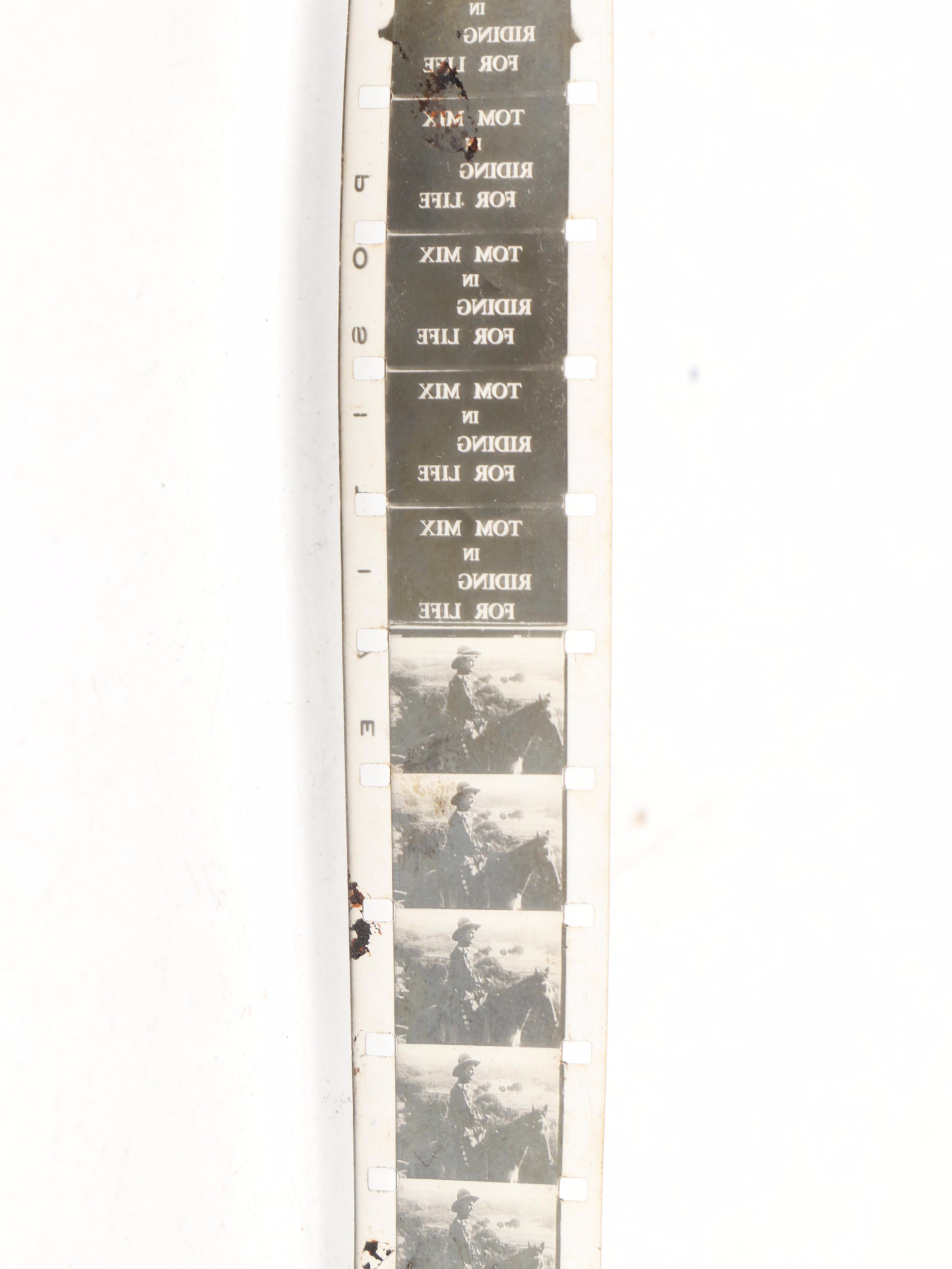 Excel 16mm Movie Projector with Mickey Mouse and Other Film Reels