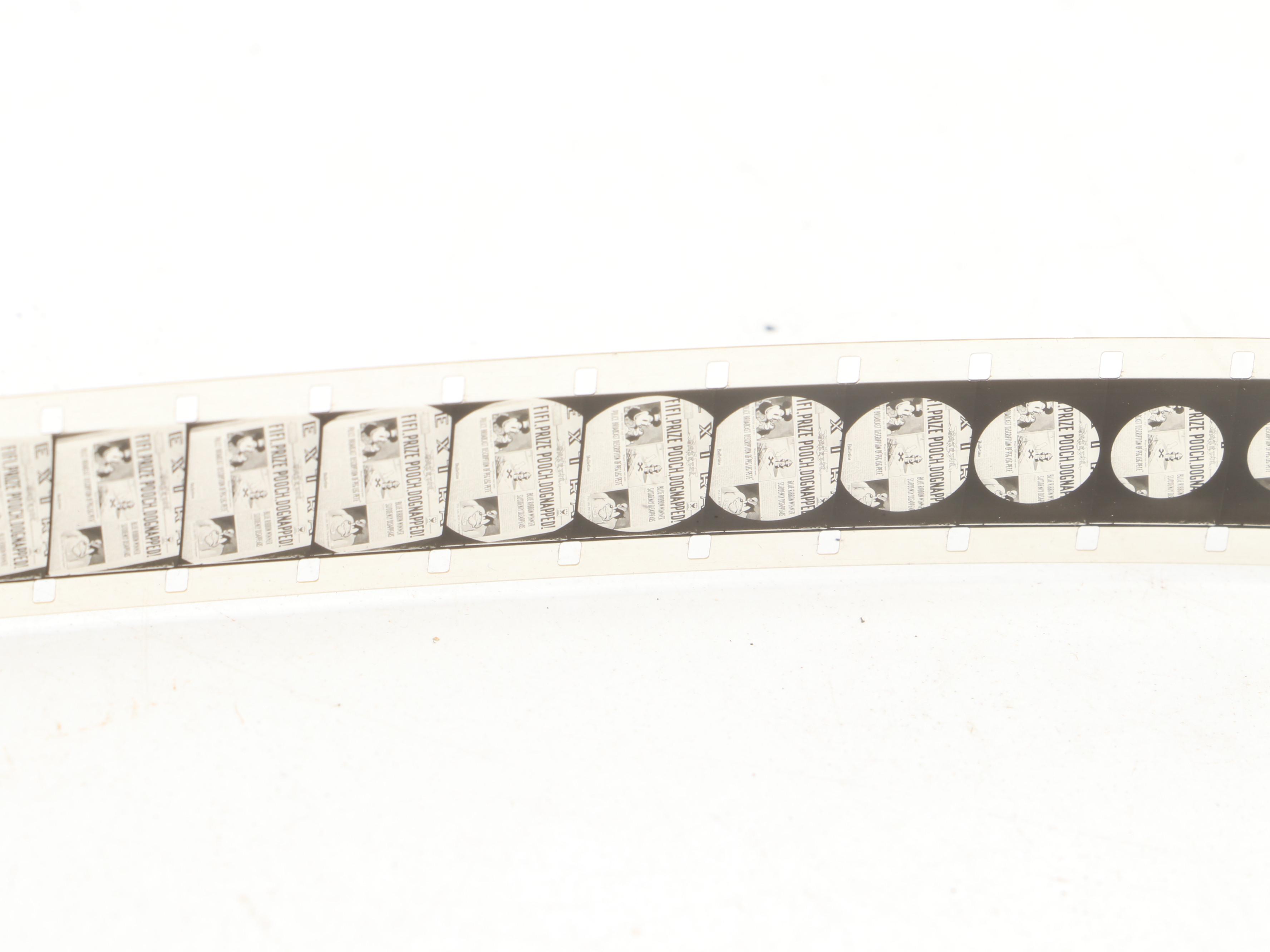 Excel 16mm Movie Projector with Mickey Mouse and Other Film Reels