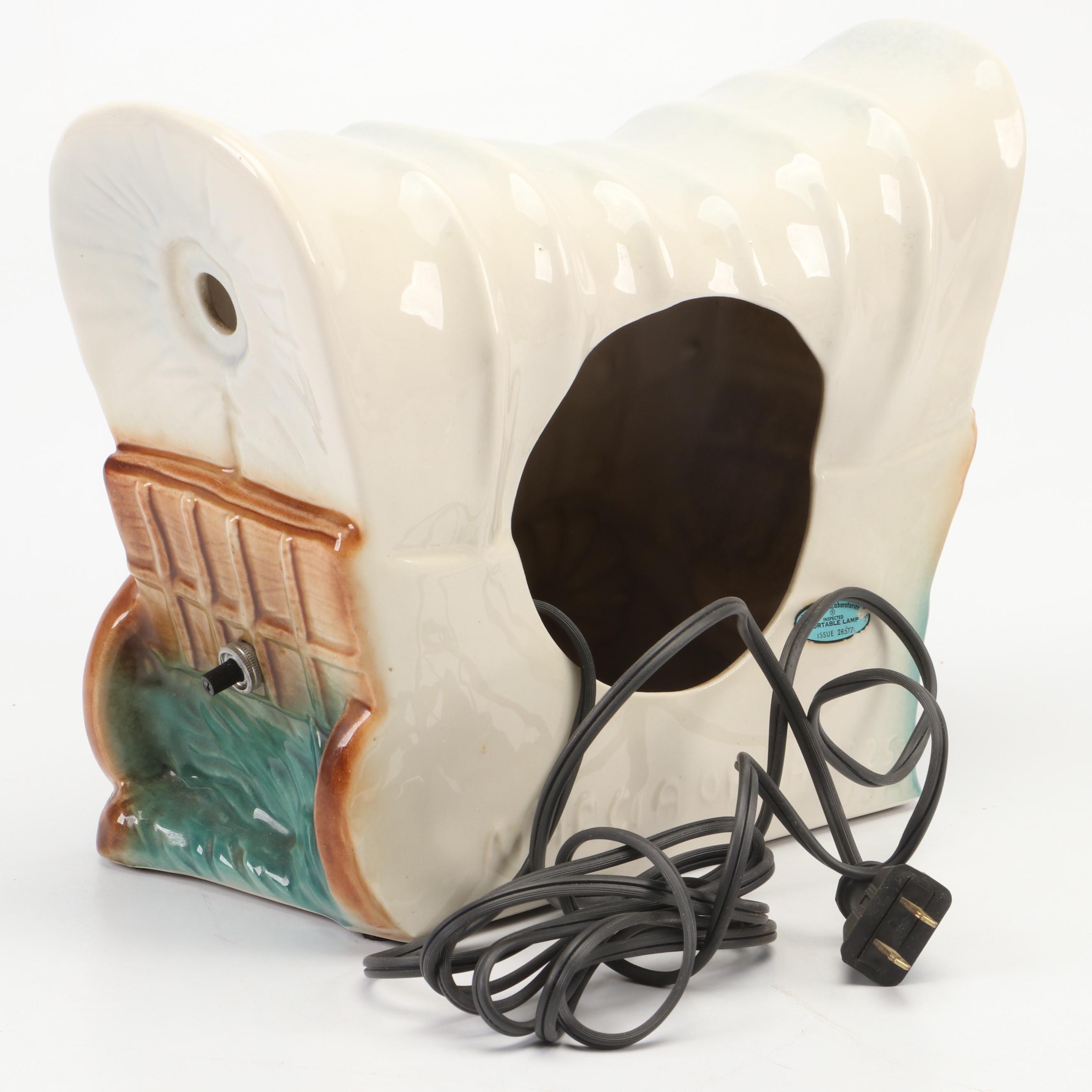 Cast Iron Conestoga Wagon Doorstop and Marcia of California Ceramic Lamp