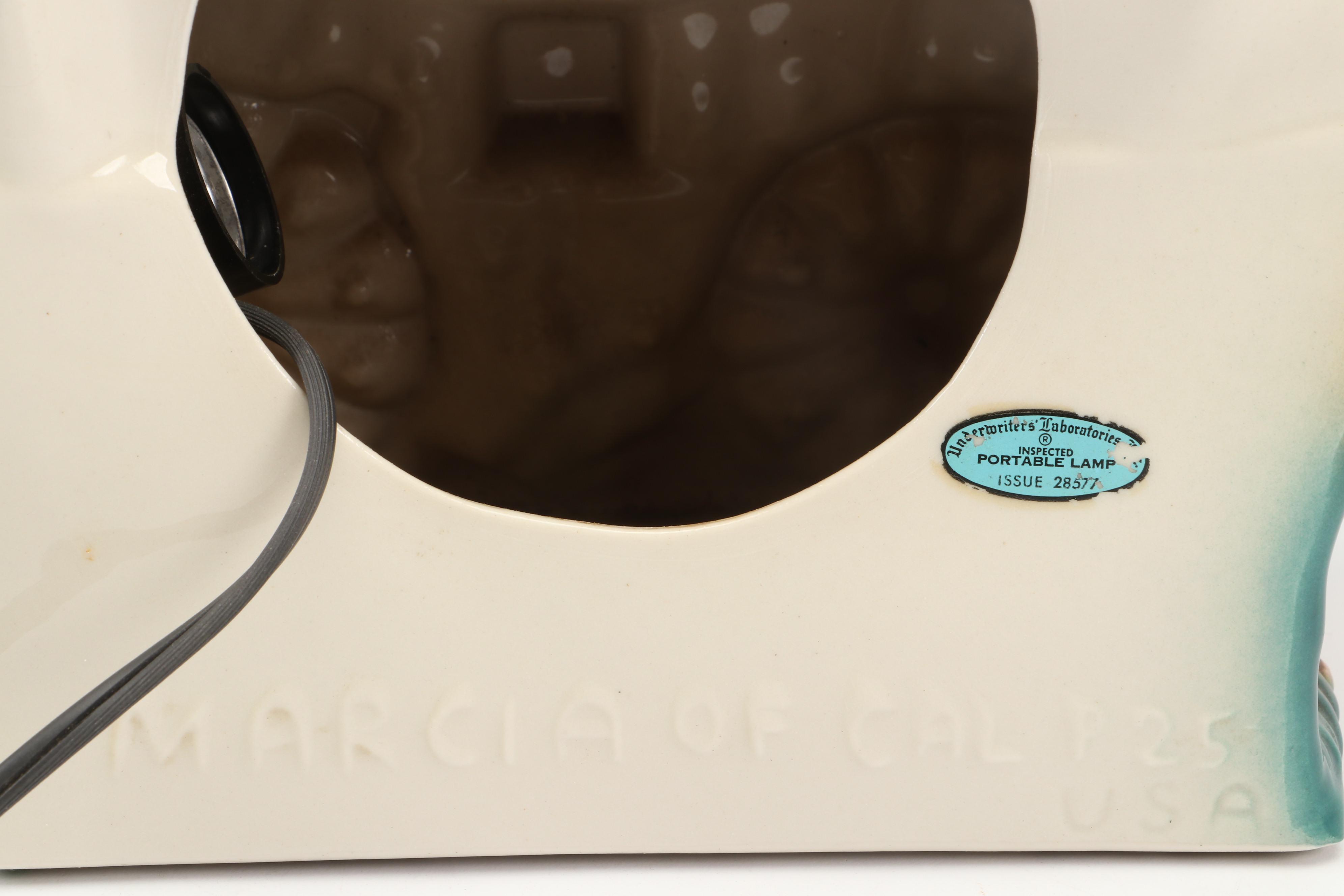 Cast Iron Conestoga Wagon Doorstop and Marcia of California Ceramic Lamp