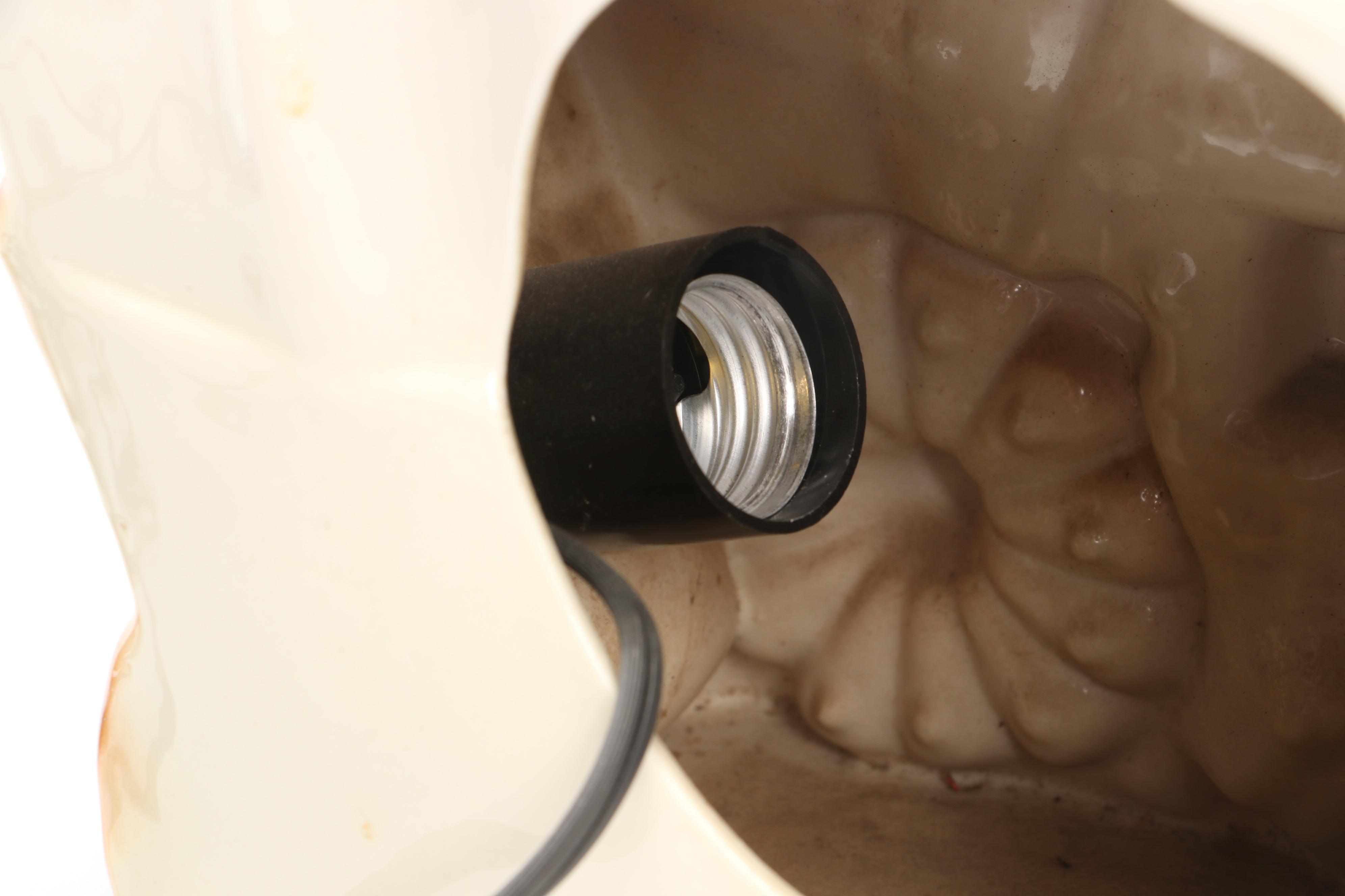 Cast Iron Conestoga Wagon Doorstop and Marcia of California Ceramic Lamp