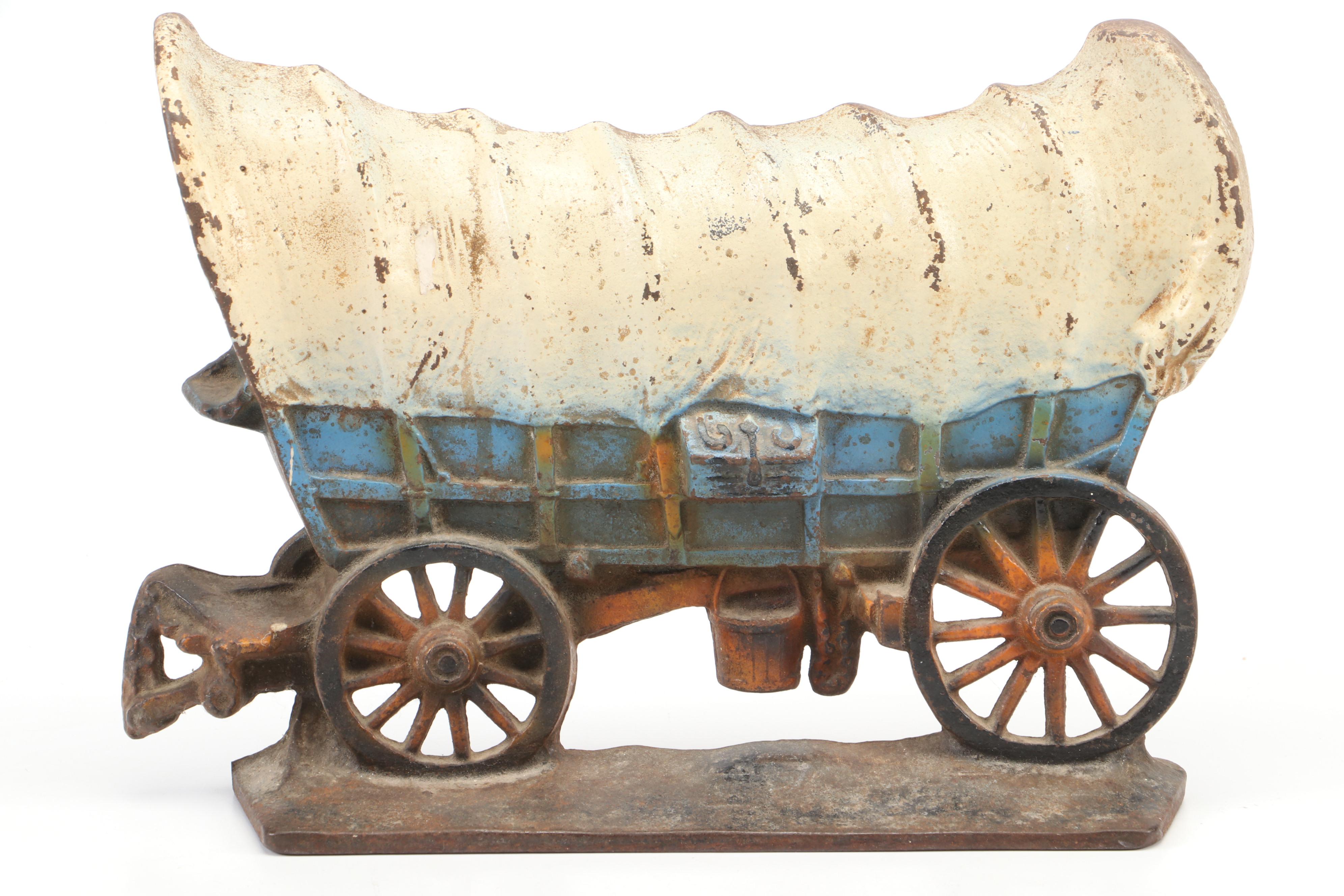 Cast Iron Conestoga Wagon Doorstop and Marcia of California Ceramic Lamp