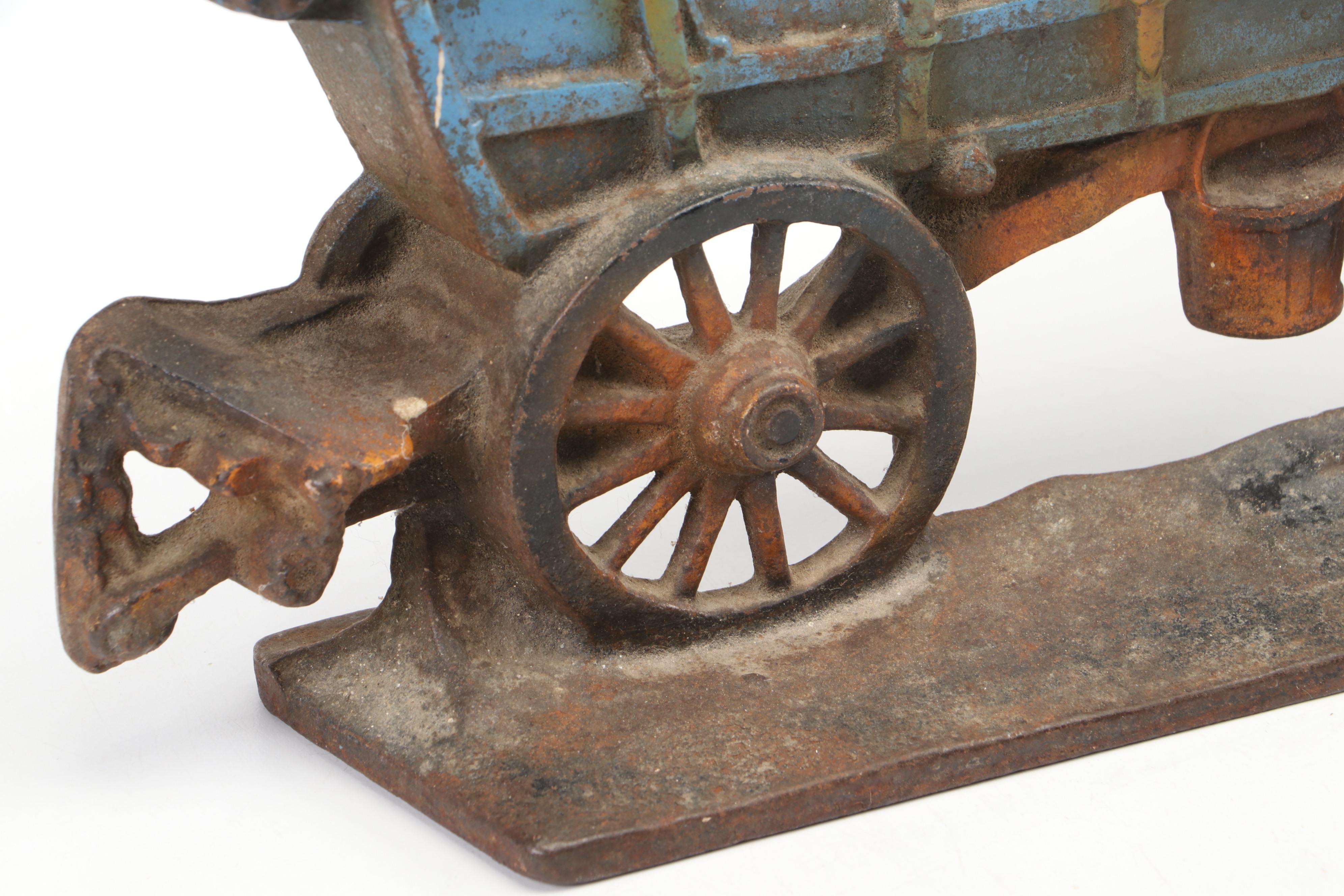 Cast Iron Conestoga Wagon Doorstop and Marcia of California Ceramic Lamp