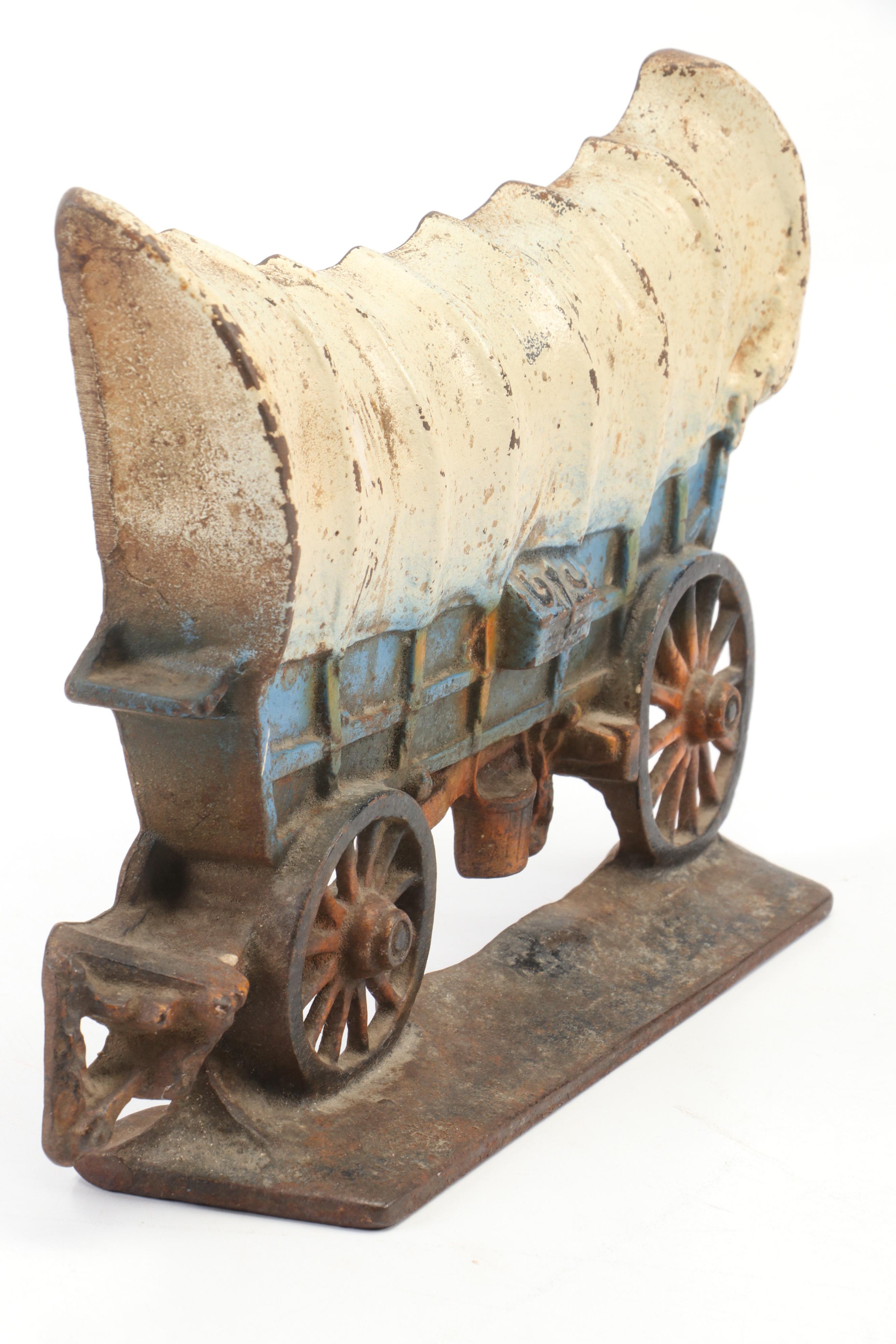 Cast Iron Conestoga Wagon Doorstop and Marcia of California Ceramic Lamp