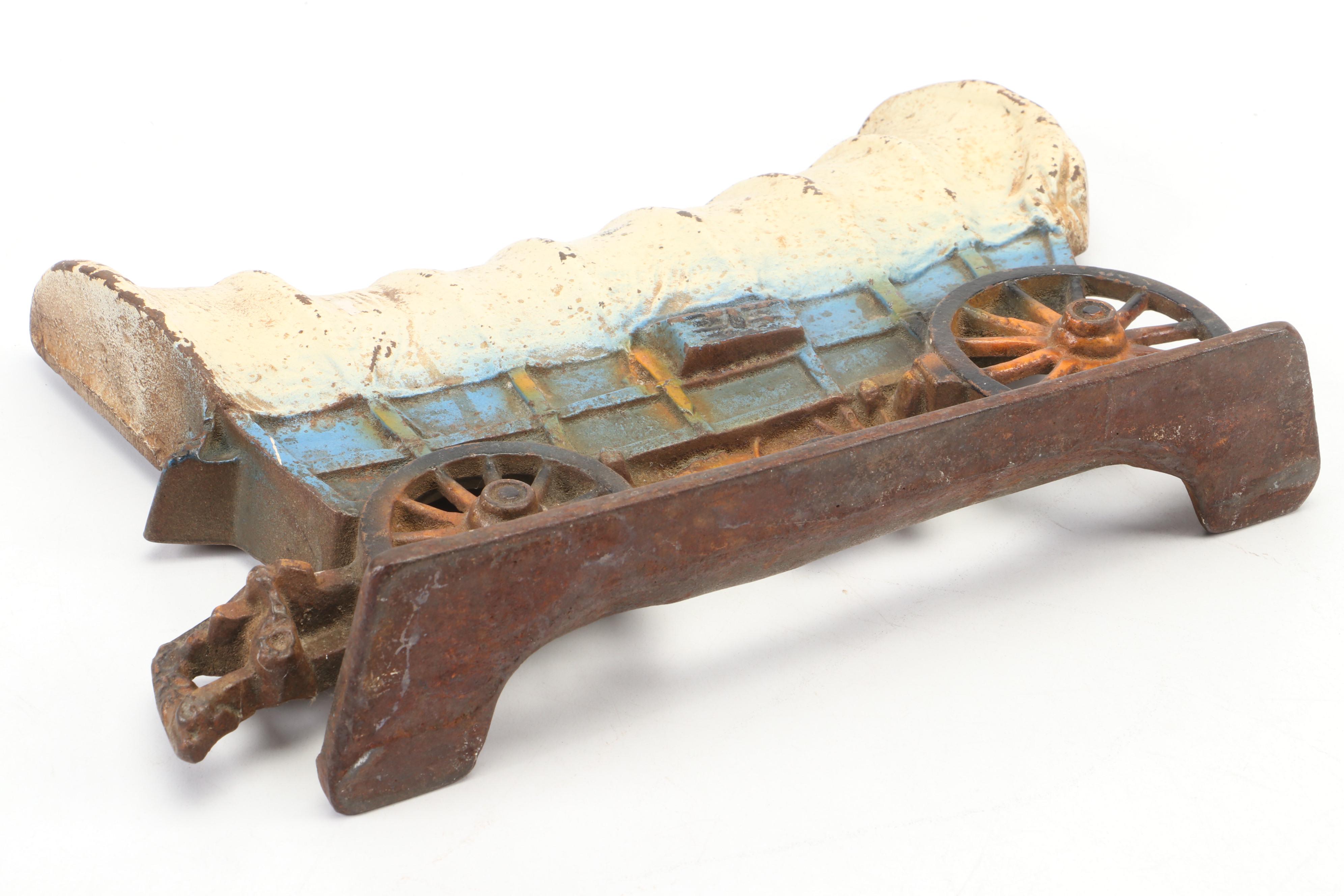 Cast Iron Conestoga Wagon Doorstop and Marcia of California Ceramic Lamp
