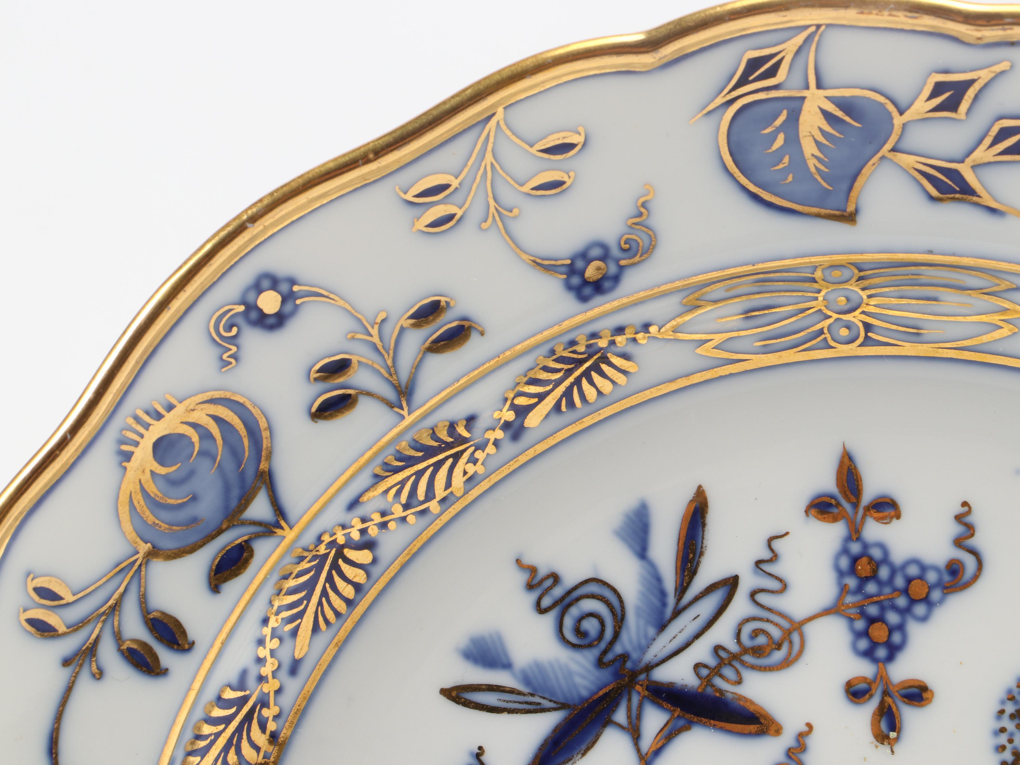 Meissen "Blue Onion" Gilt Porcelain Serving Platter and Place Setting Pieces
