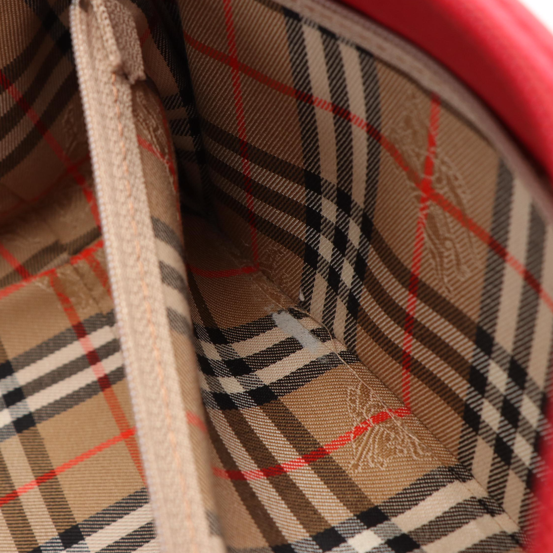 Burberrys Red Leather Barrel Style Handbag