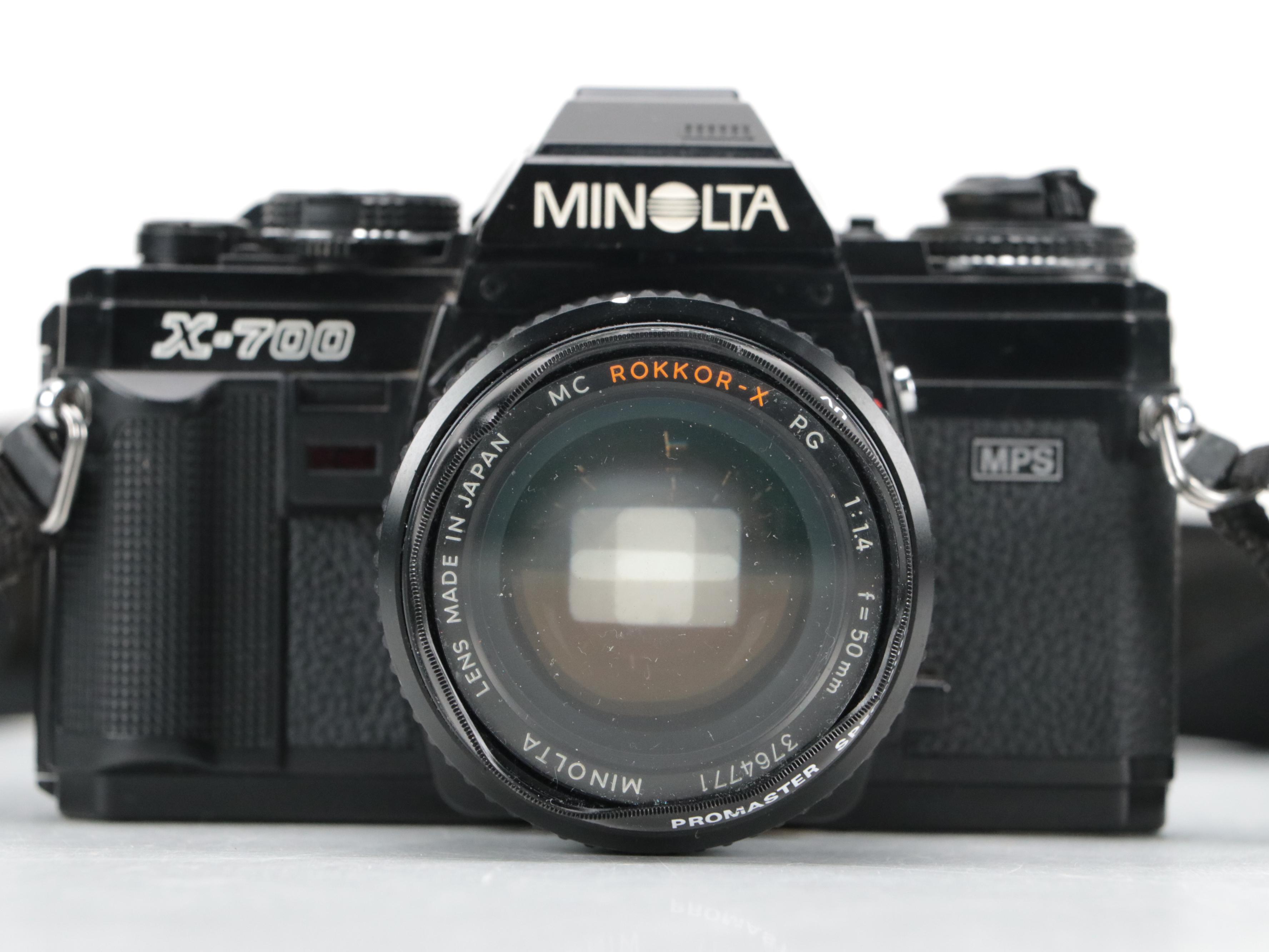 Minolta X-700 35mm Camera with Collection of Lenses, Cases and Accessories