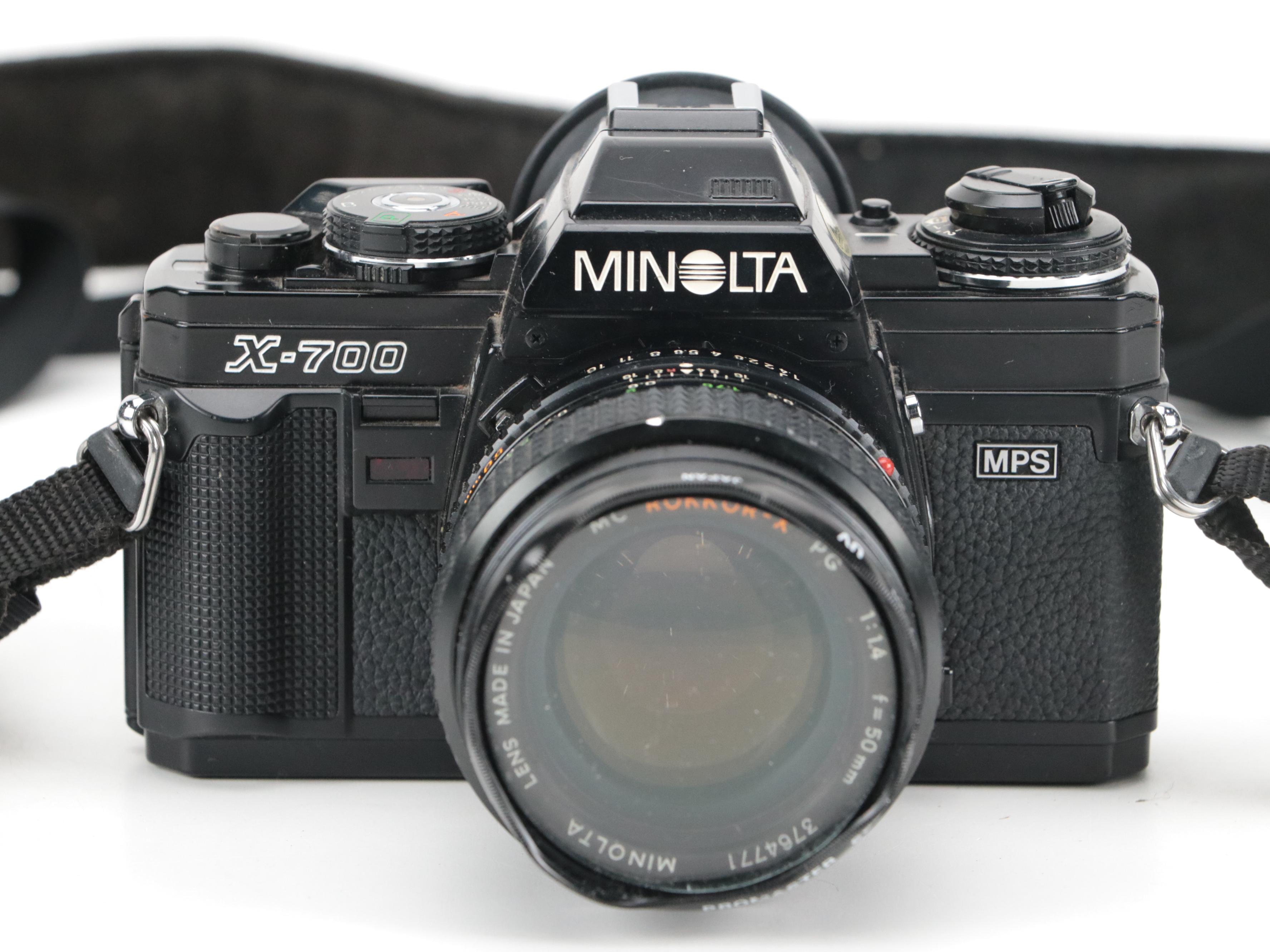 Minolta X-700 35mm Camera with Collection of Lenses, Cases and Accessories