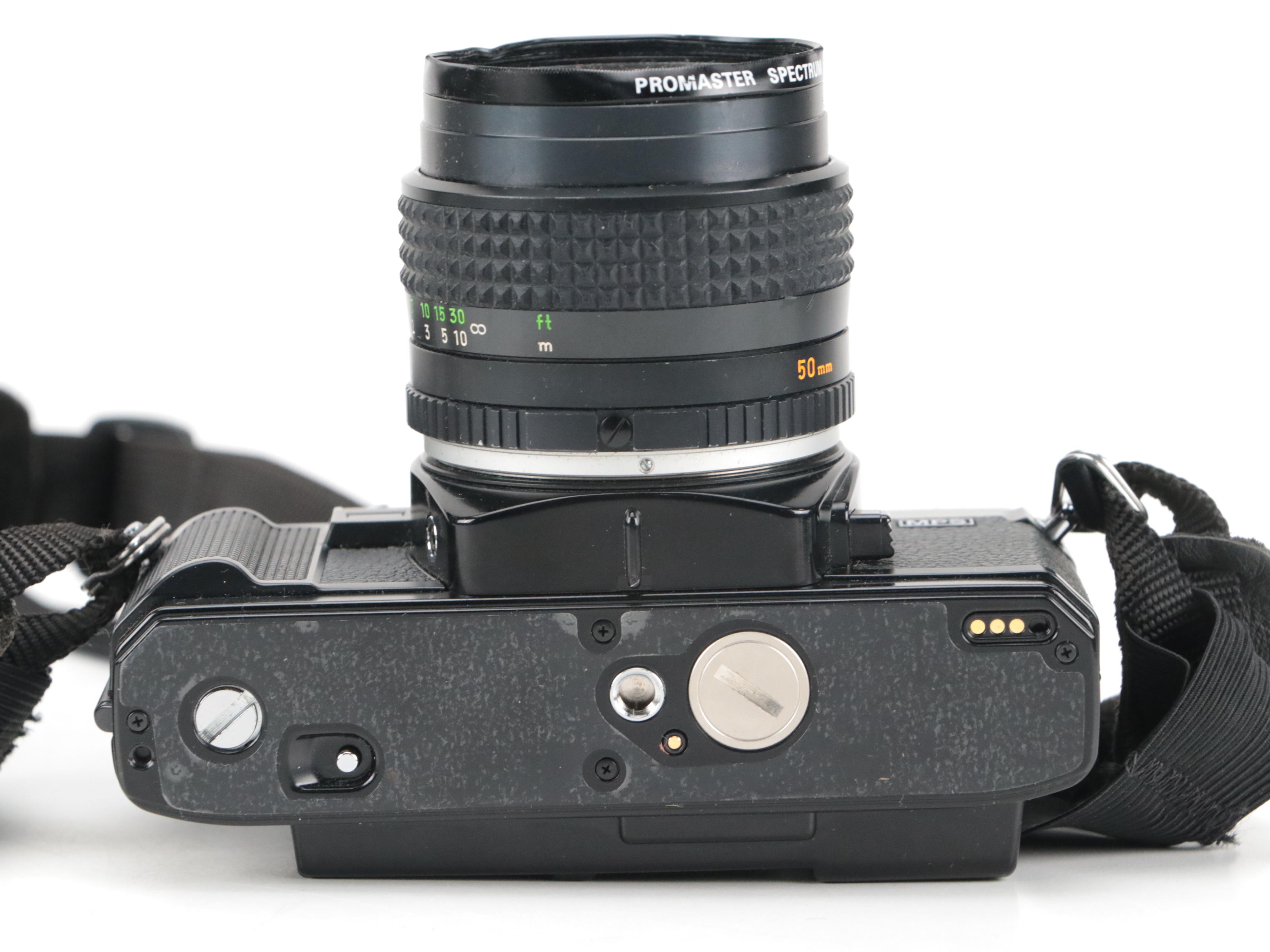 Minolta X-700 35mm Camera with Collection of Lenses, Cases and Accessories