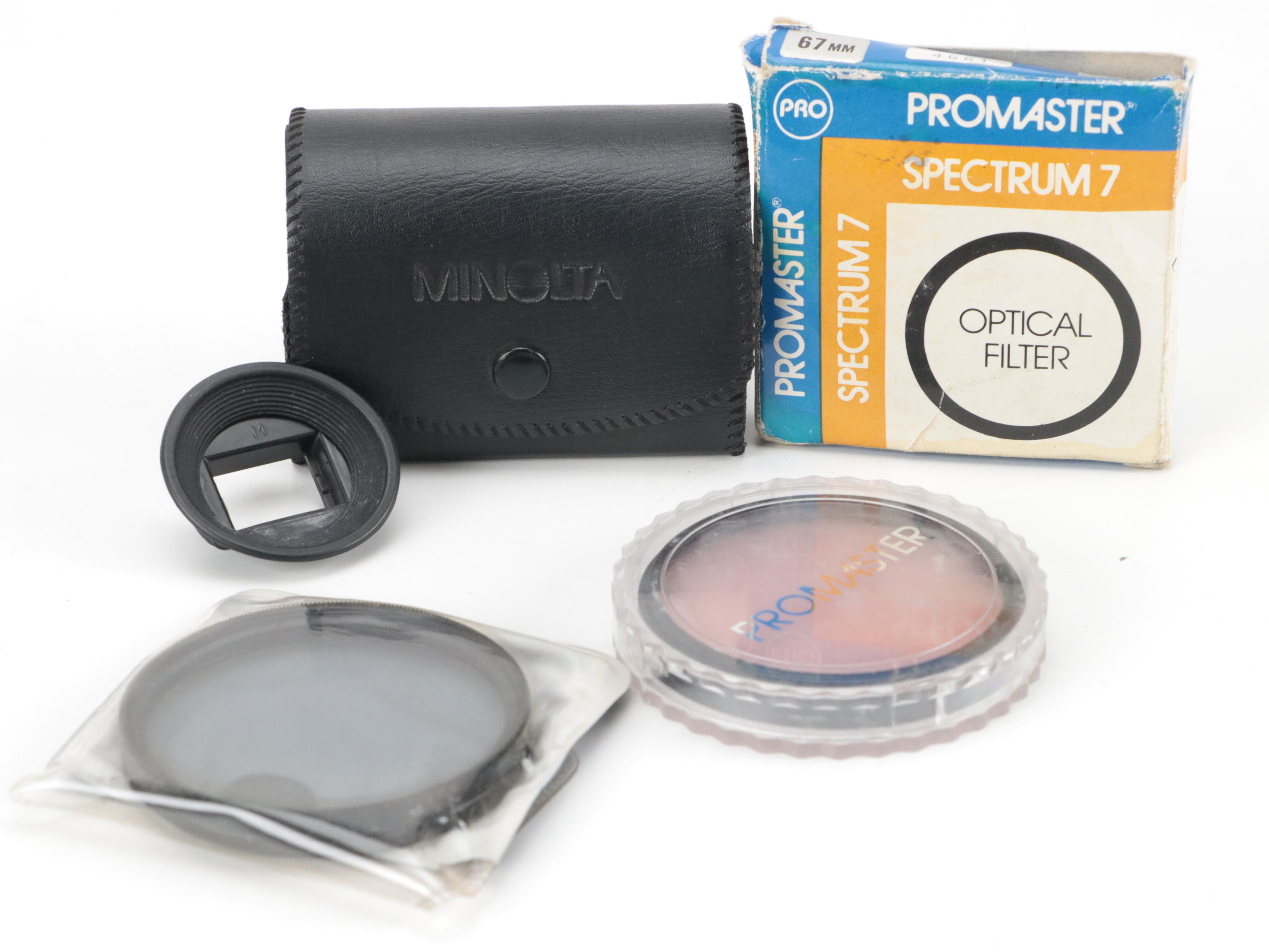 Minolta X-700 35mm Camera with Collection of Lenses, Cases and Accessories