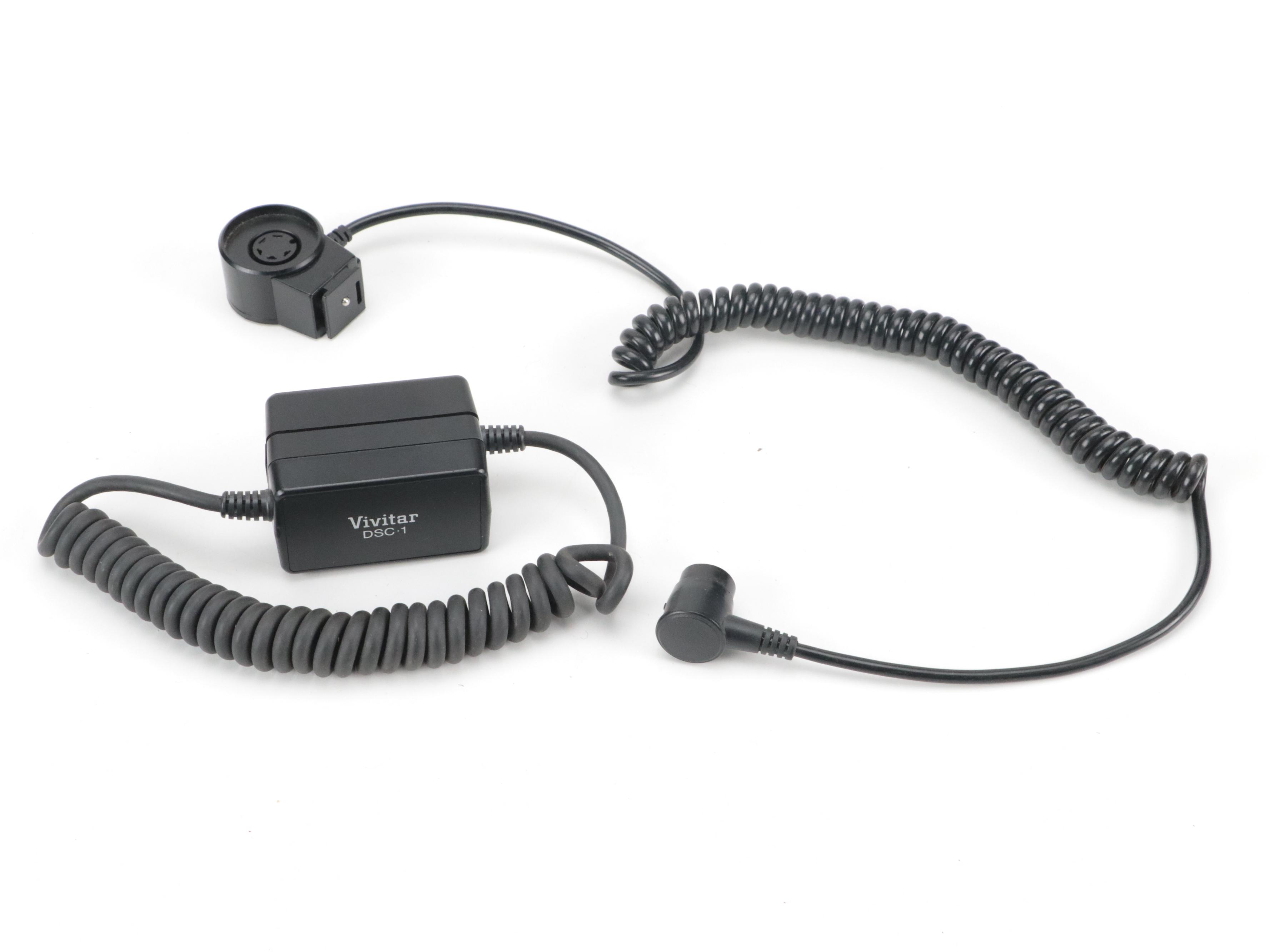 Minolta X-700 35mm Camera with Collection of Lenses, Cases and Accessories