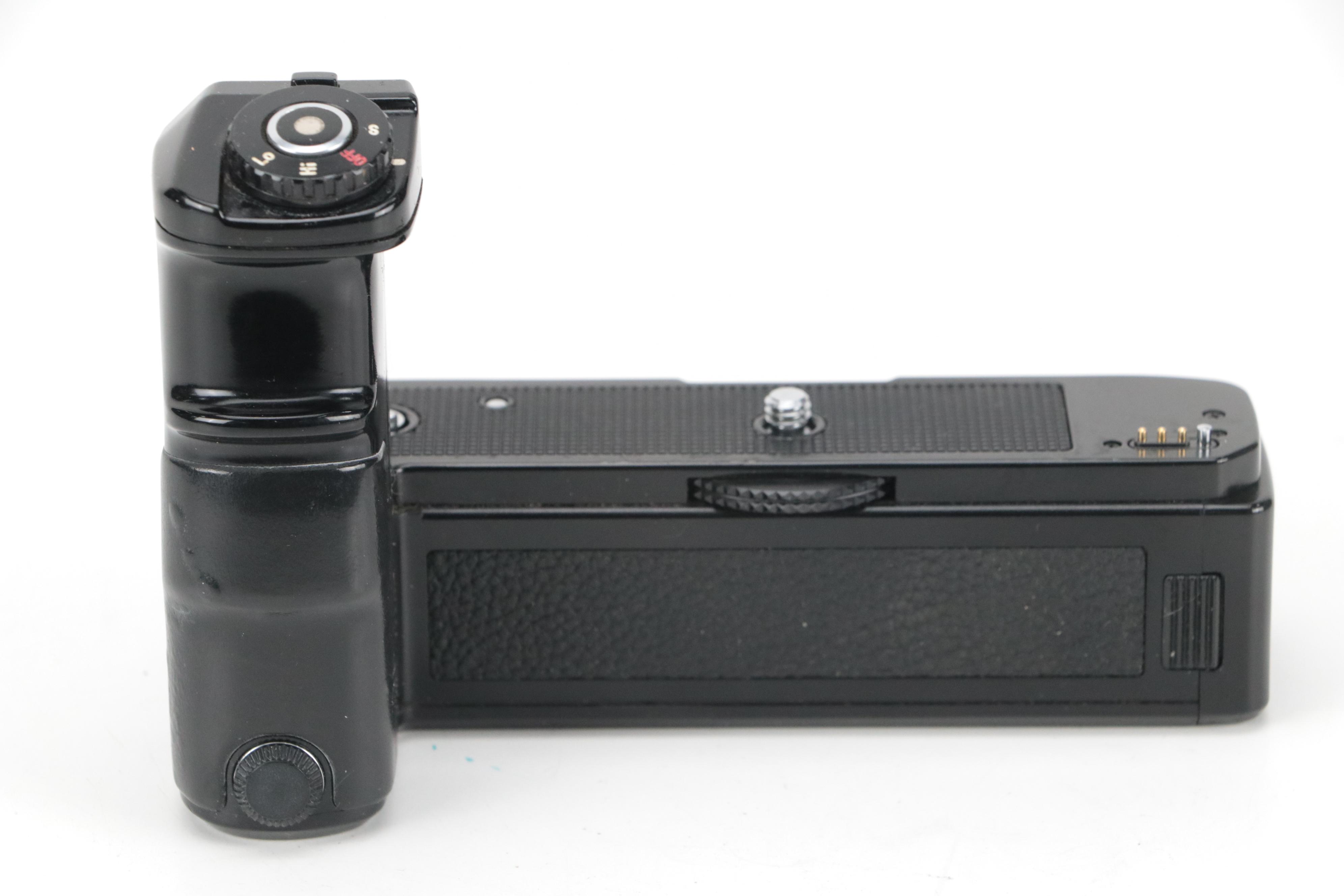 Minolta X-700 35mm Camera with Collection of Lenses, Cases and Accessories