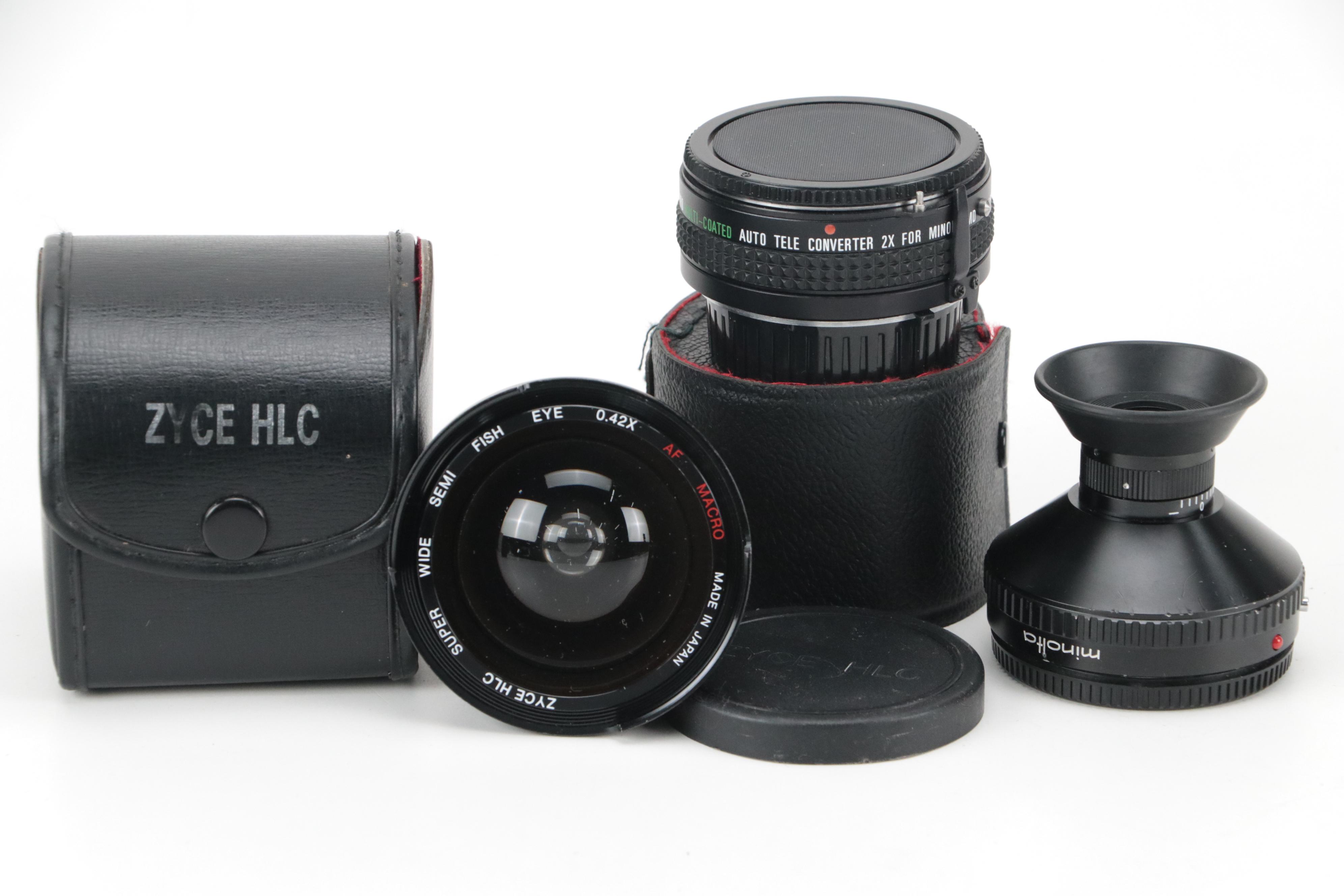 Minolta X-700 35mm Camera with Collection of Lenses, Cases and Accessories