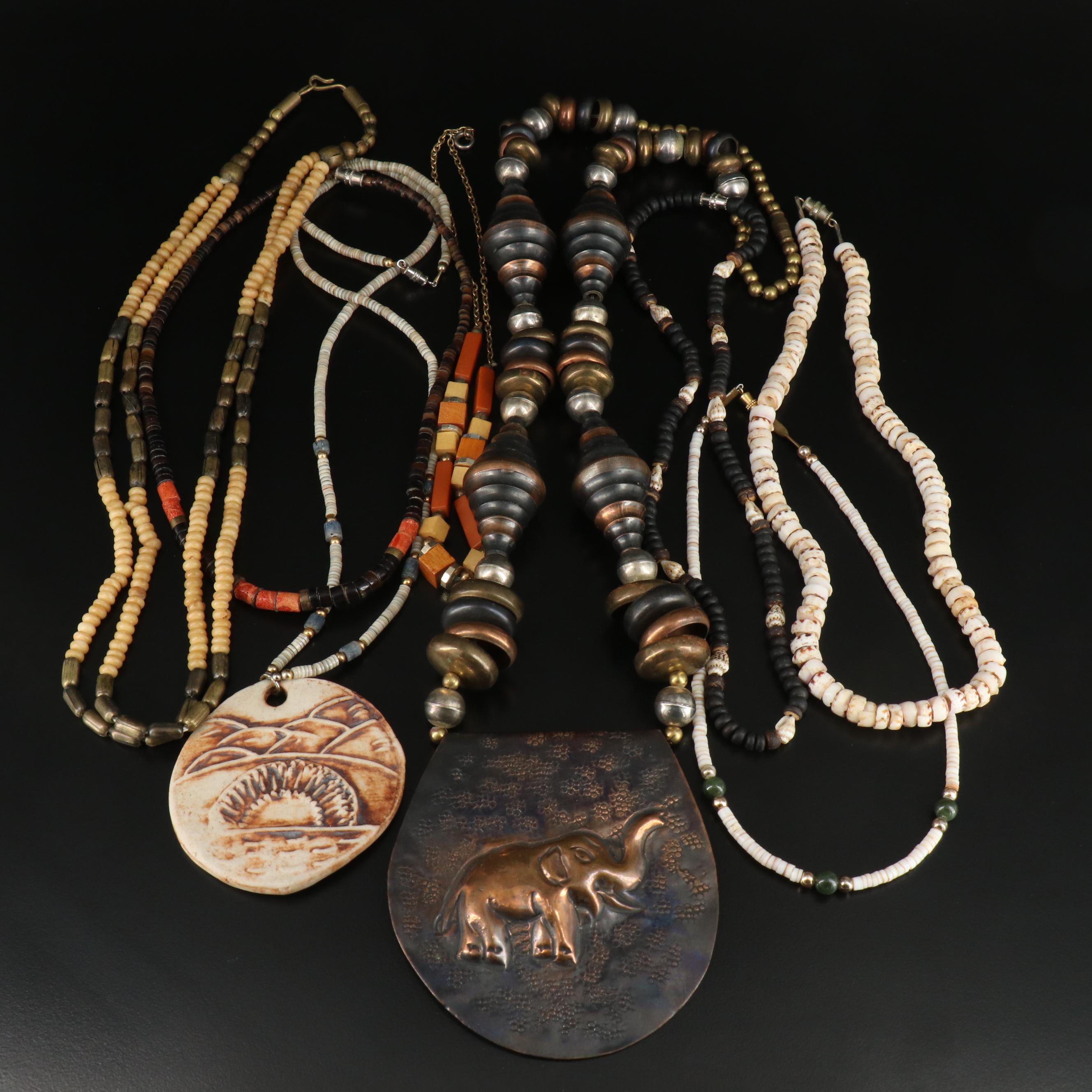 Shell and Wood Featured in Vintage Necklace Assortment