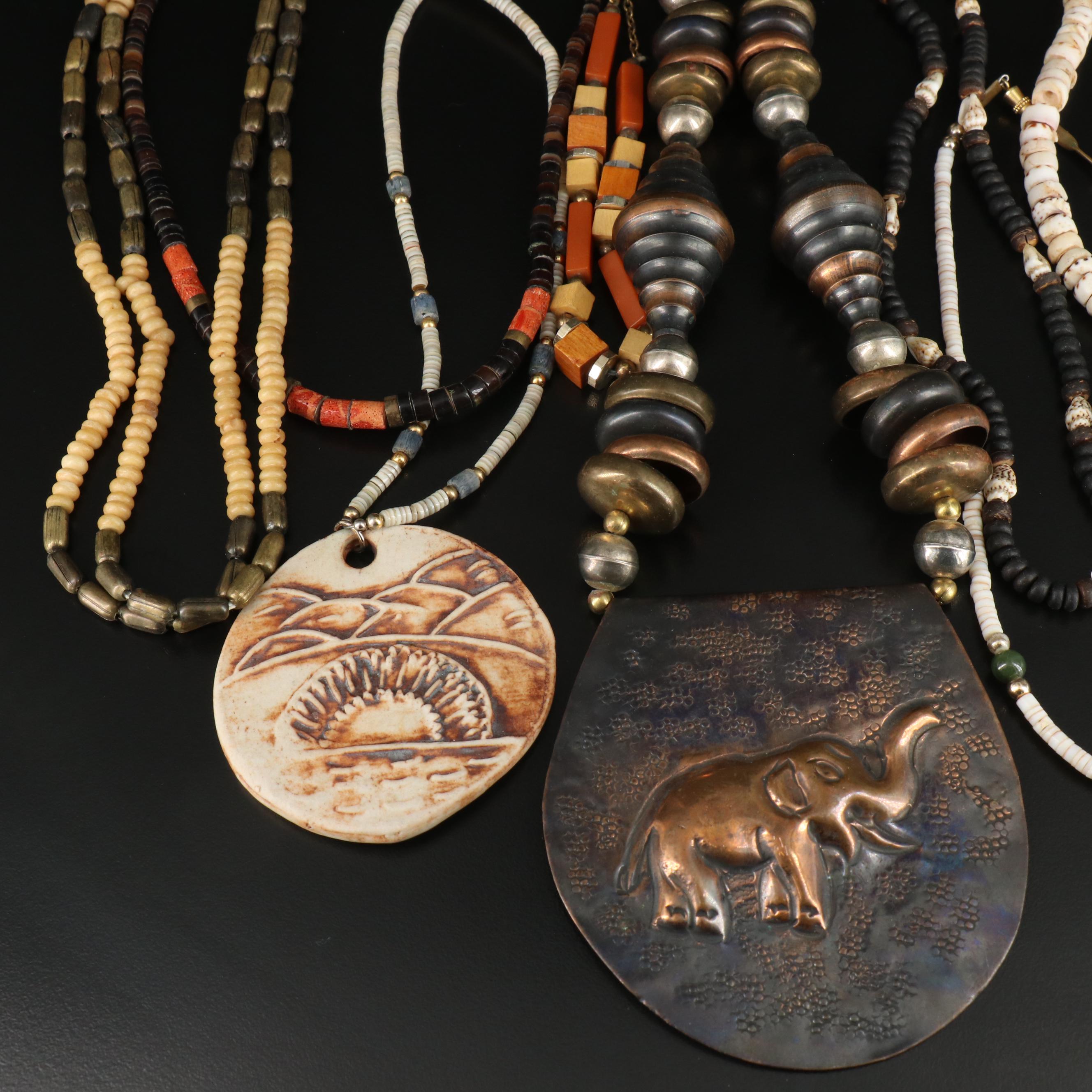 Shell and Wood Featured in Vintage Necklace Assortment