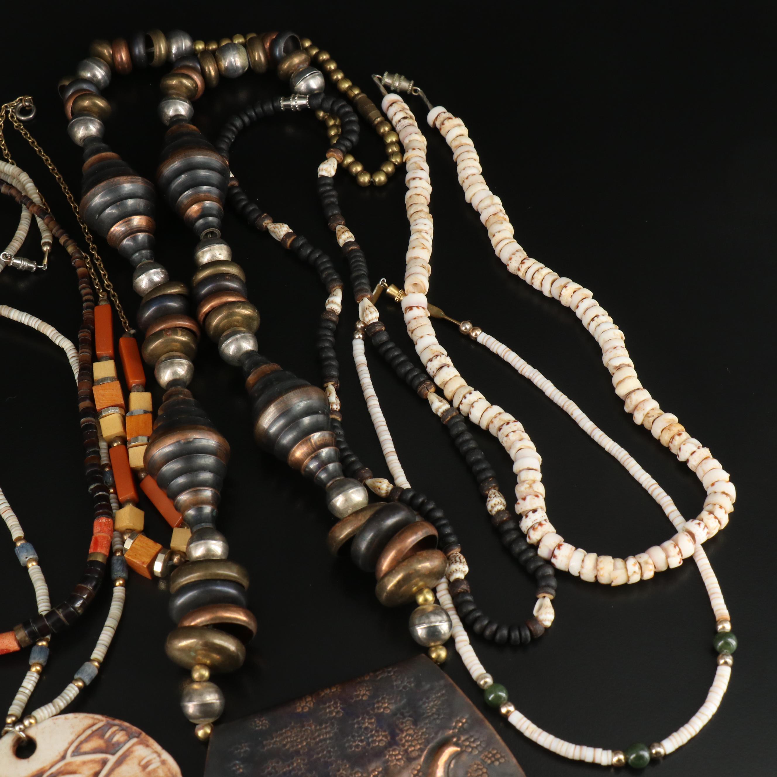 Shell and Wood Featured in Vintage Necklace Assortment