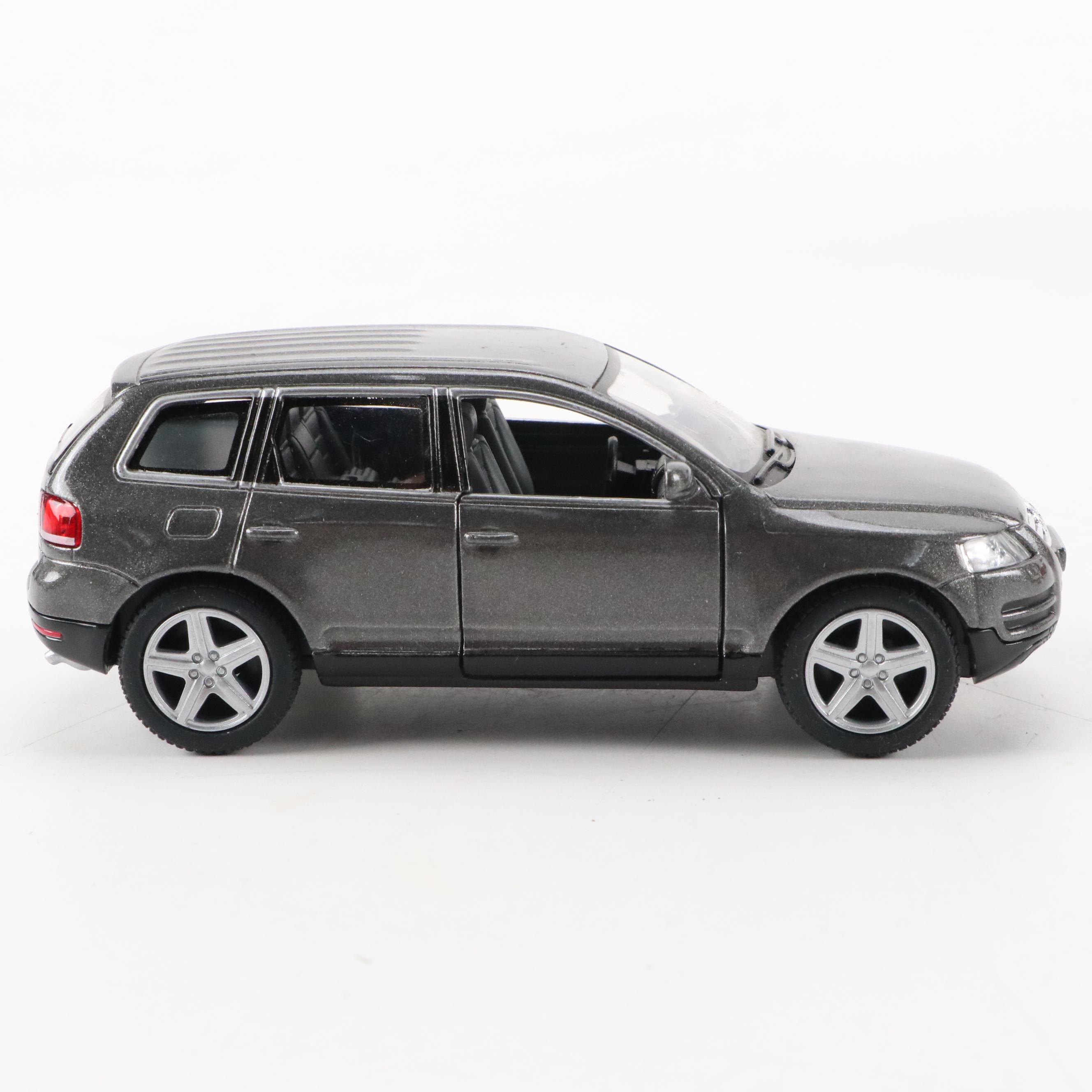 Škoda Octavia Car in Display Case with Other Collectible Toy Cars