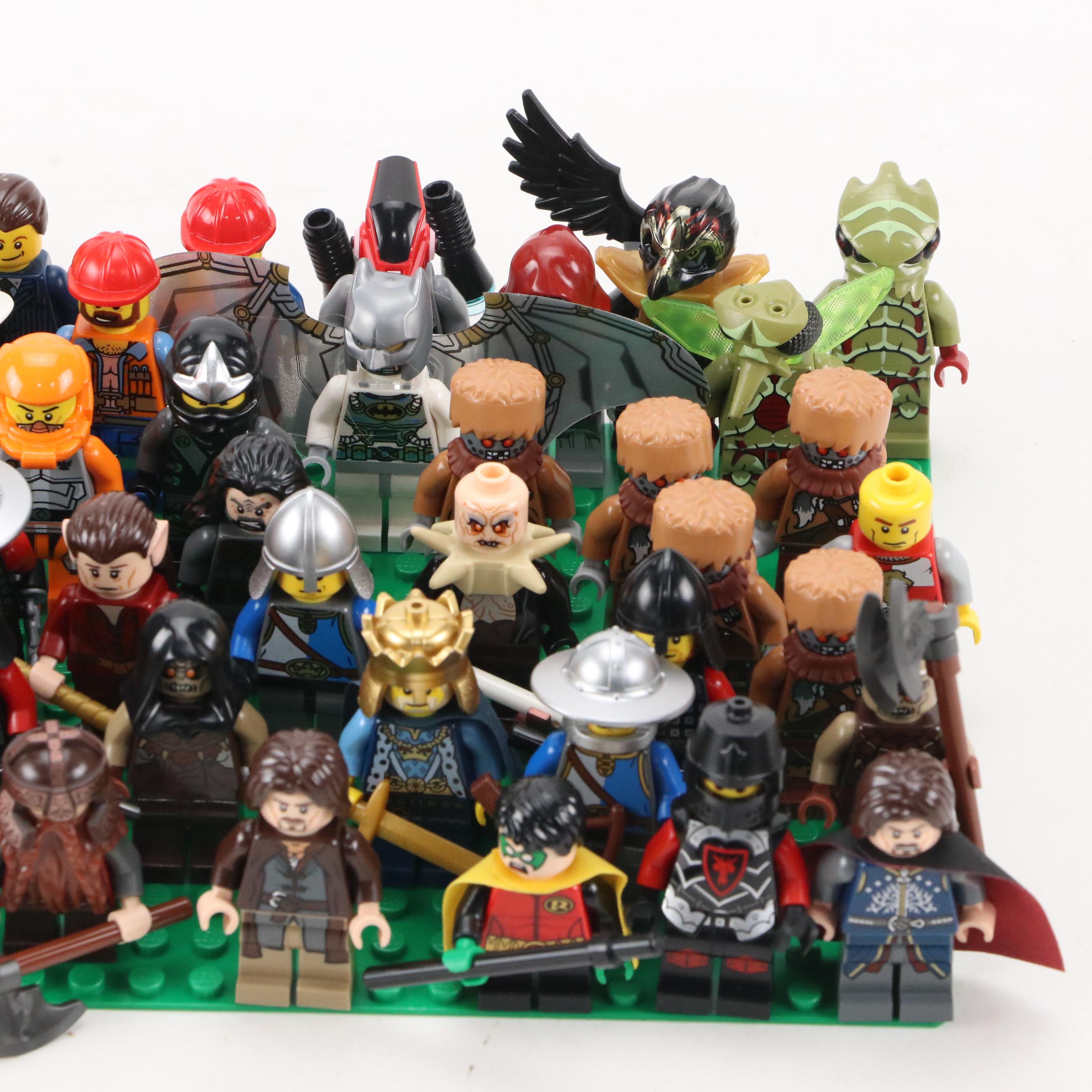 LEGO Mini Figures with Assorted Bricks and Instruction Booklets