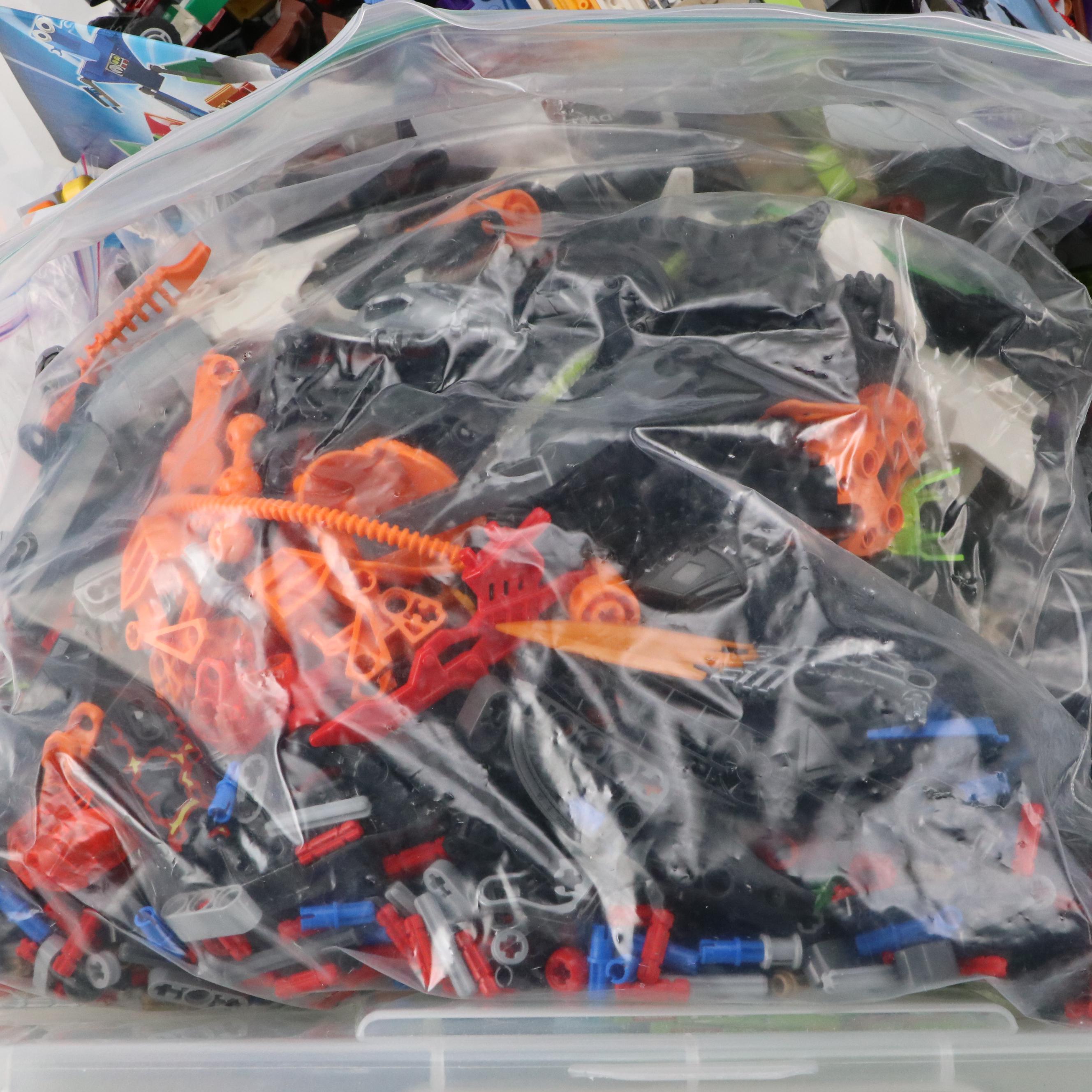 LEGO Mini Figures with Assorted Bricks and Instruction Booklets