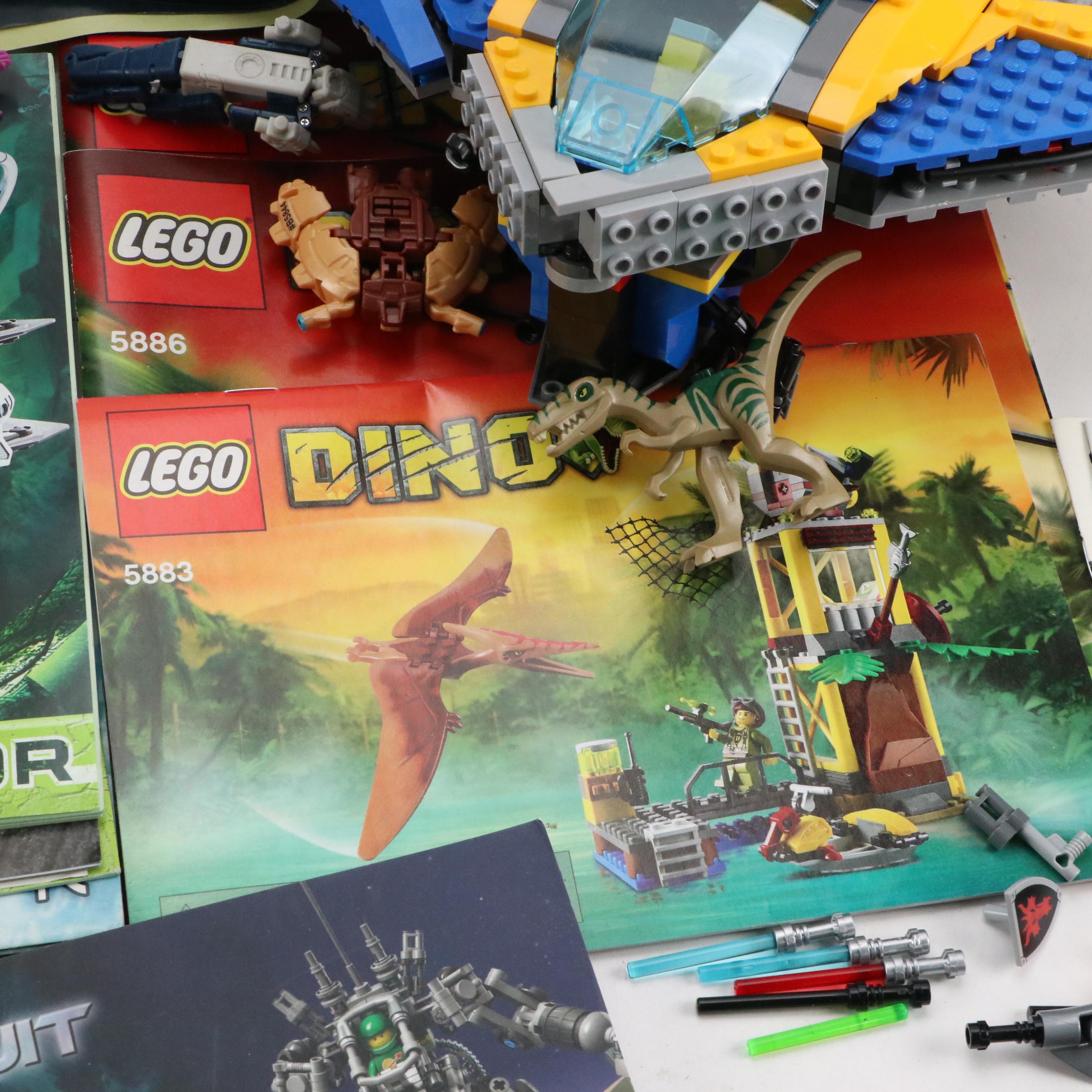 LEGO Mini Figures with Assorted Bricks and Instruction Booklets